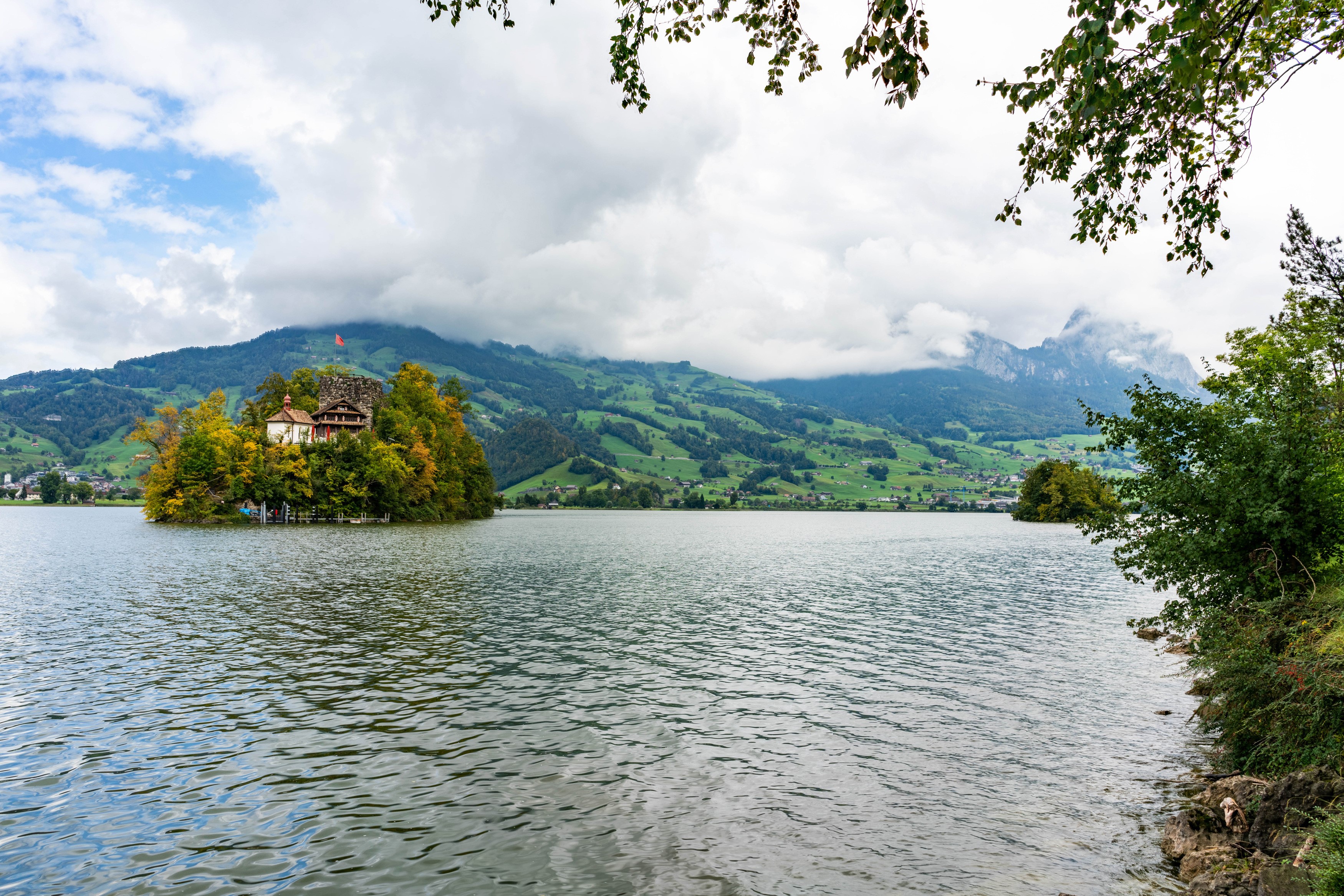 Schwanau Island on a Swiss Lake with Mountains HD Wallpaper
