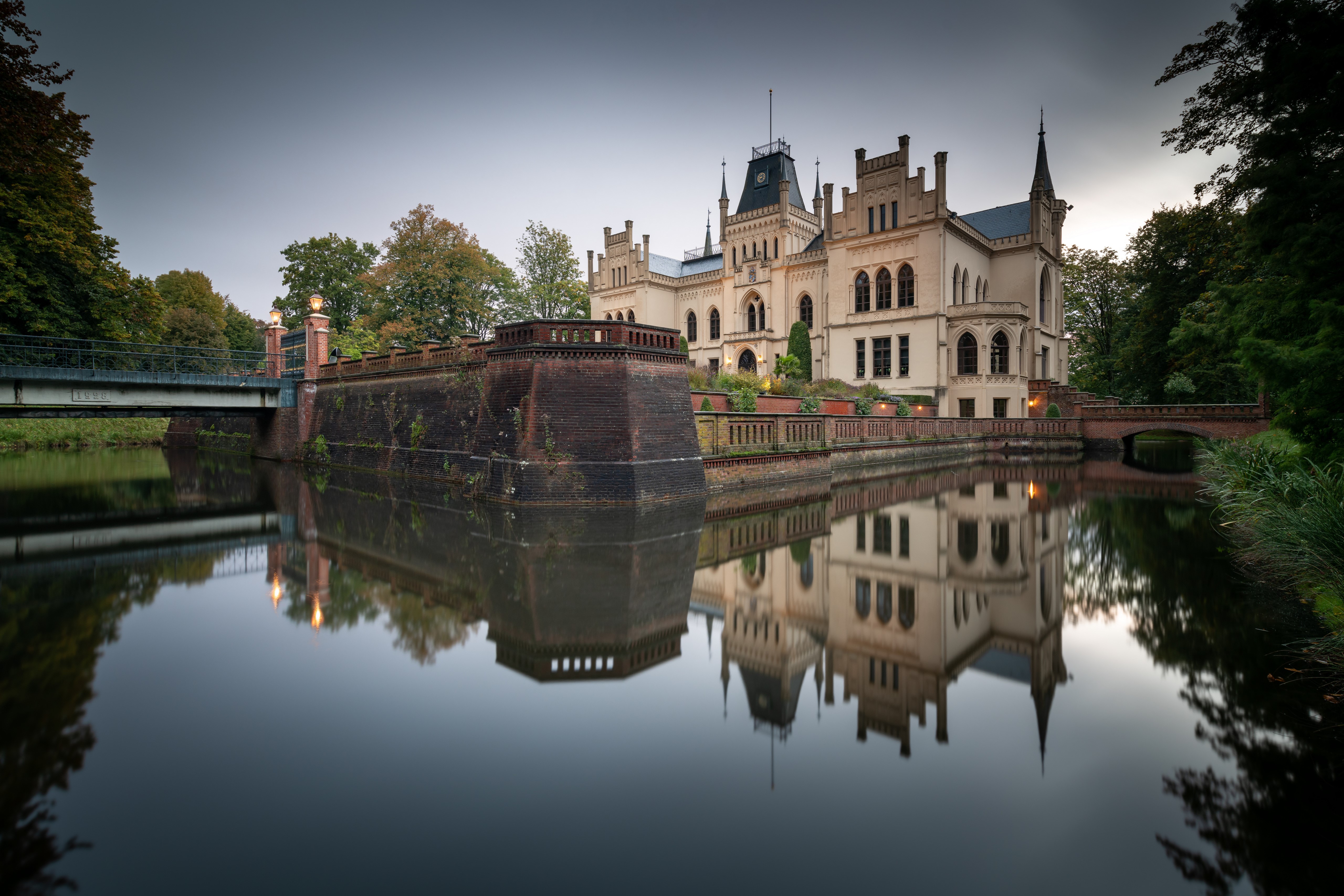 Evenburg Castle Germany with Pond Reflection HD Wallpaper