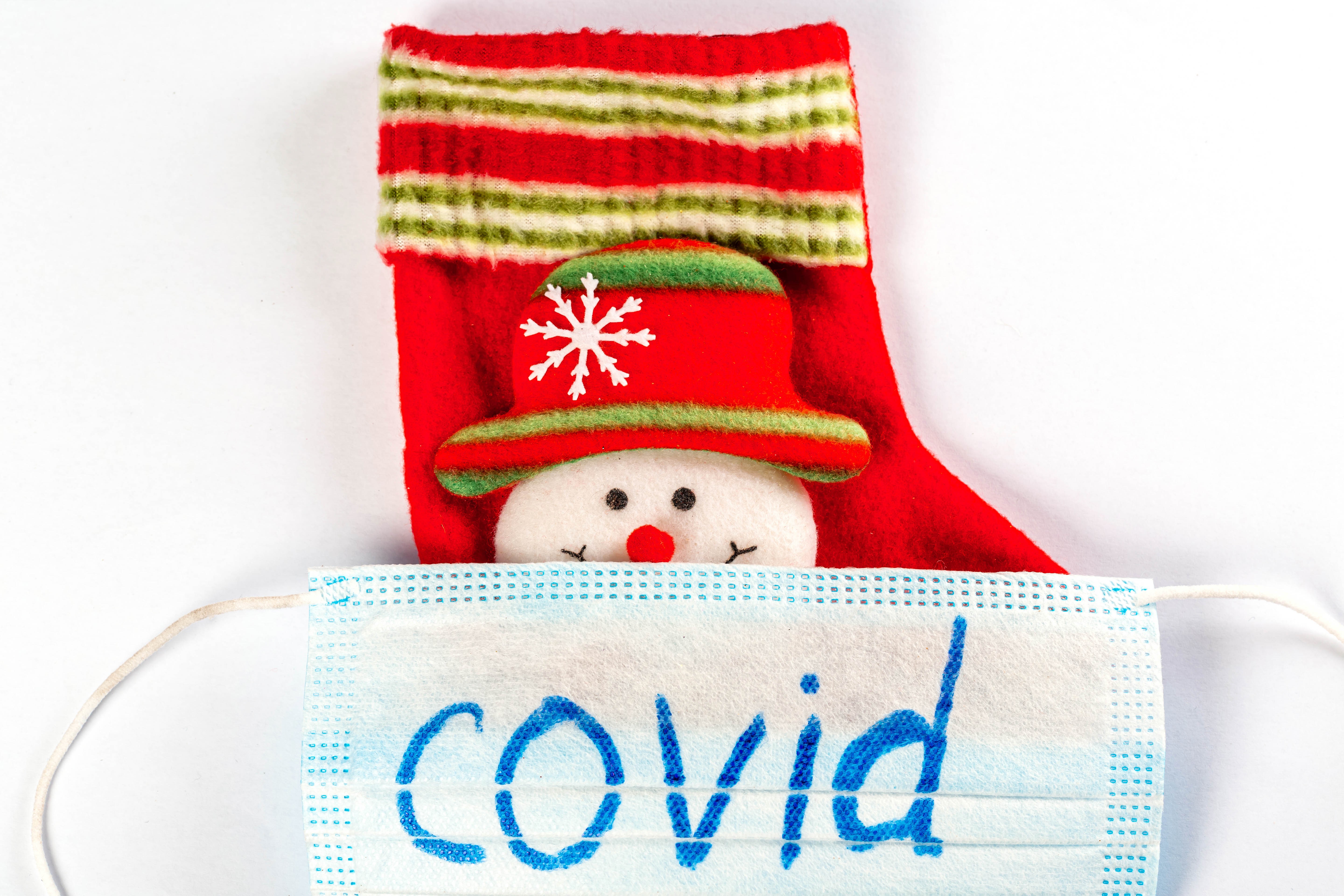 Christmas stocking with snowman and COVID mask HD Wallpaper