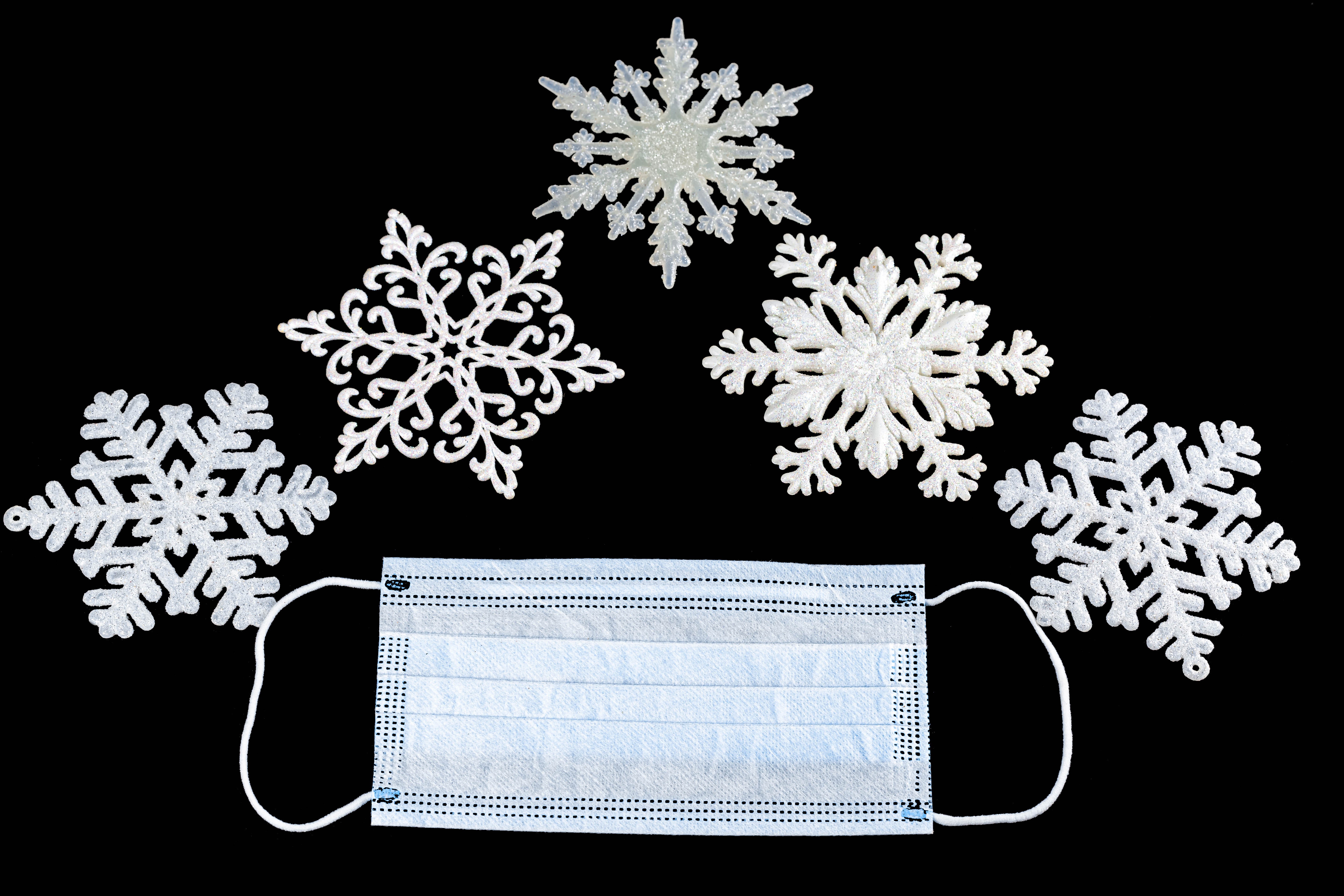 Snowflakes and Coronavirus Mask on Black Background HD Wallpaper