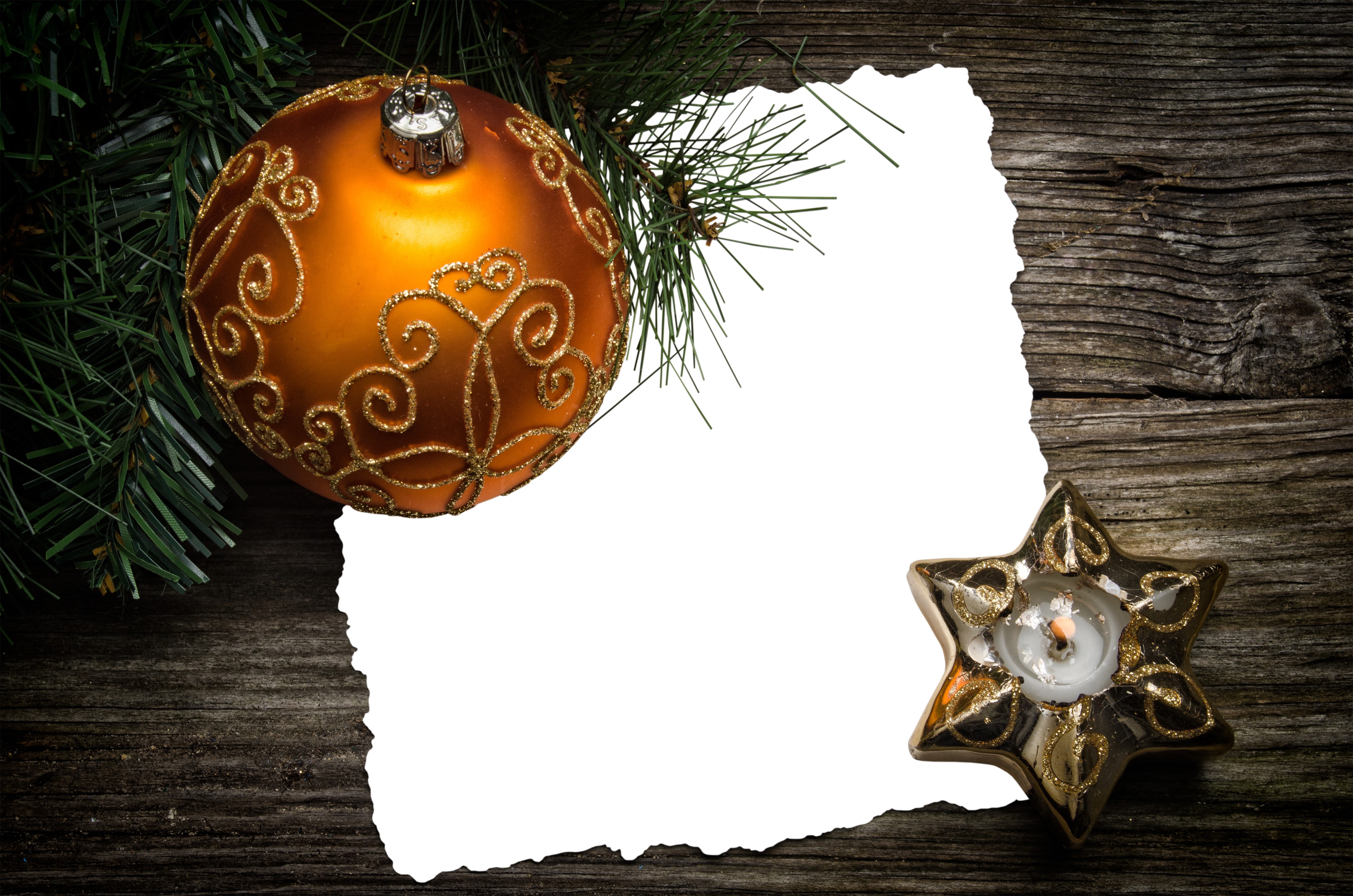 Christmas ornament and candle on wood planks HD Wallpaper