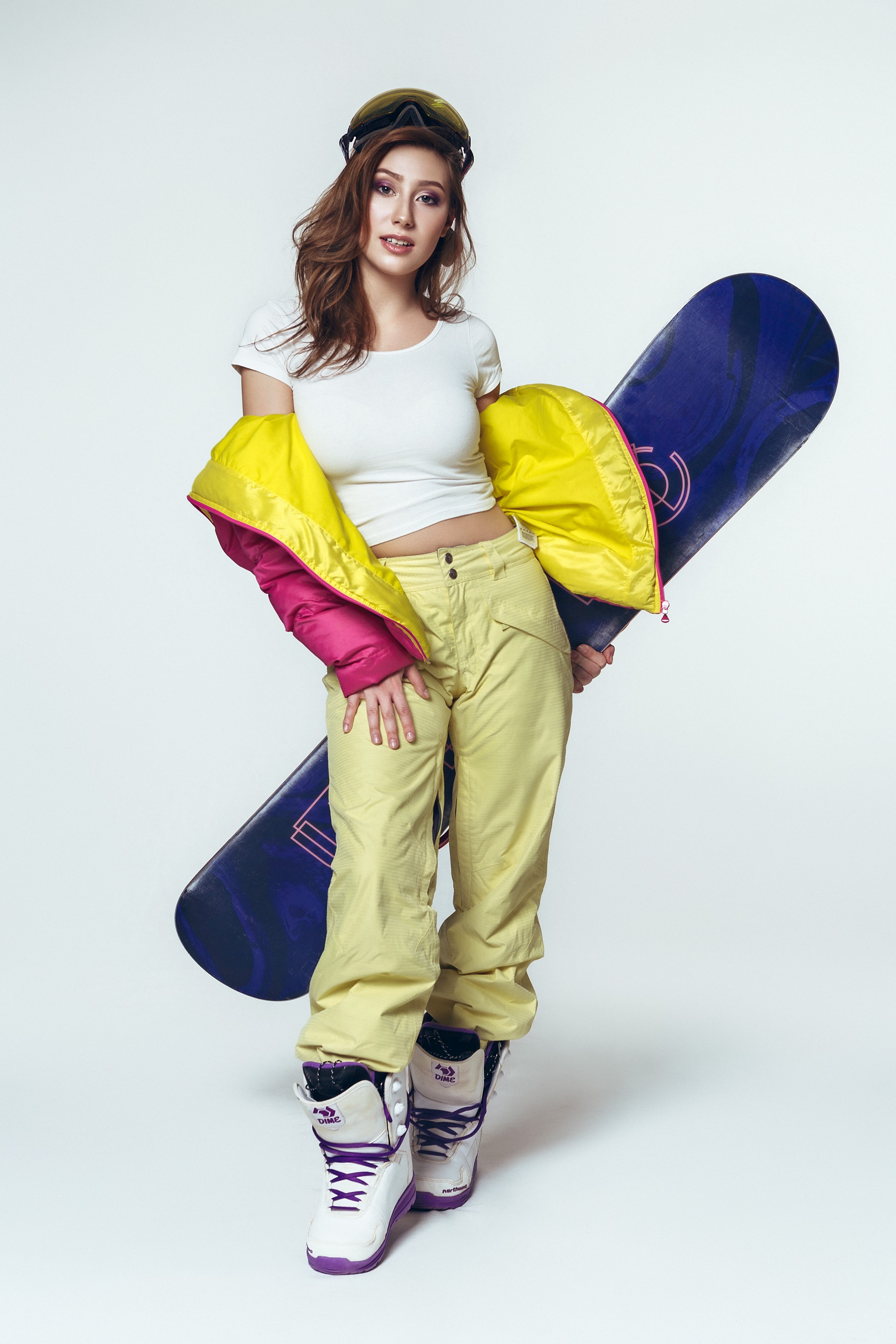 Alexandra with Snowboard and Ski Gear HD Phone Wallpaper