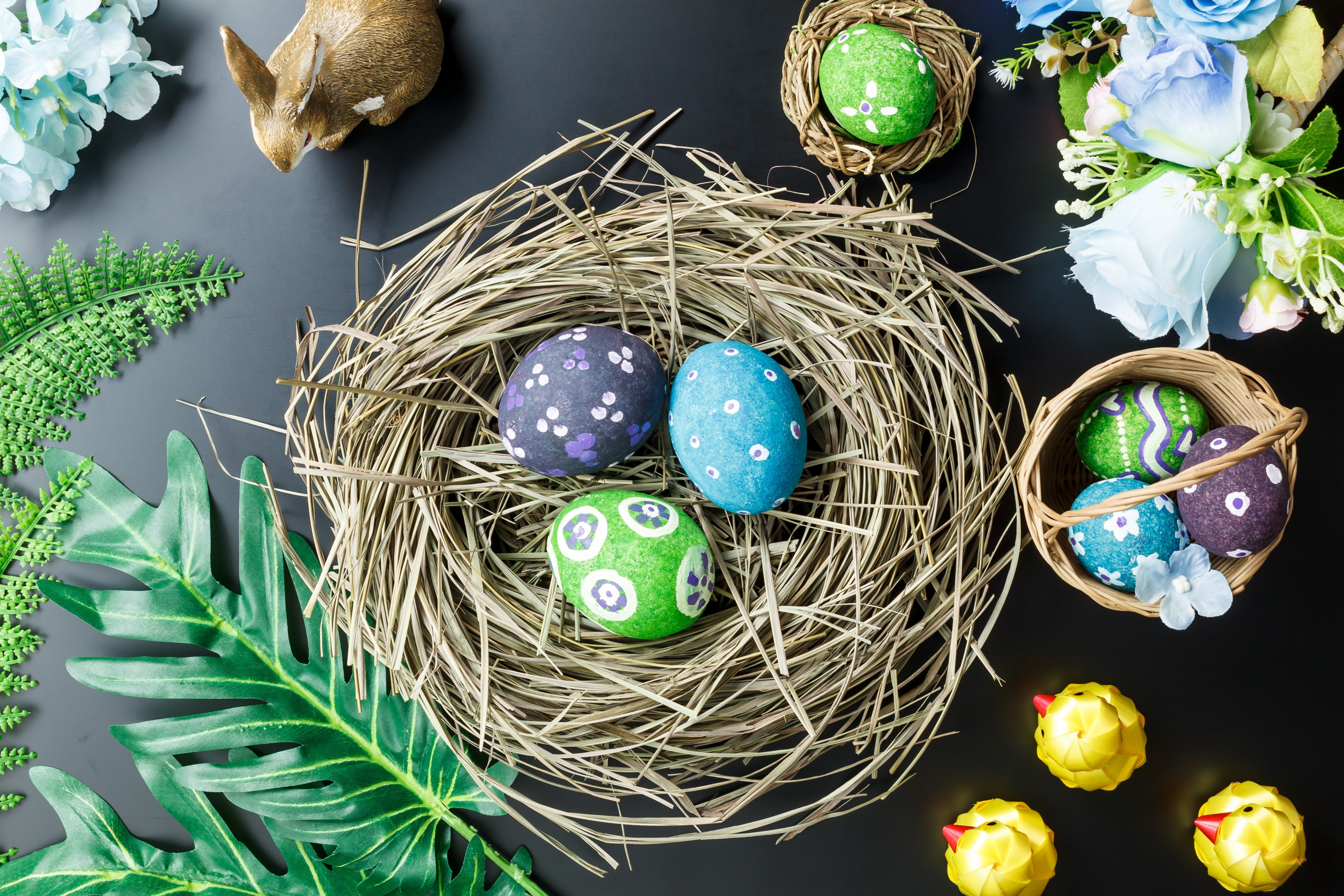 Easter Eggs in a Nest with Chicks and Flowers HD Wallpaper