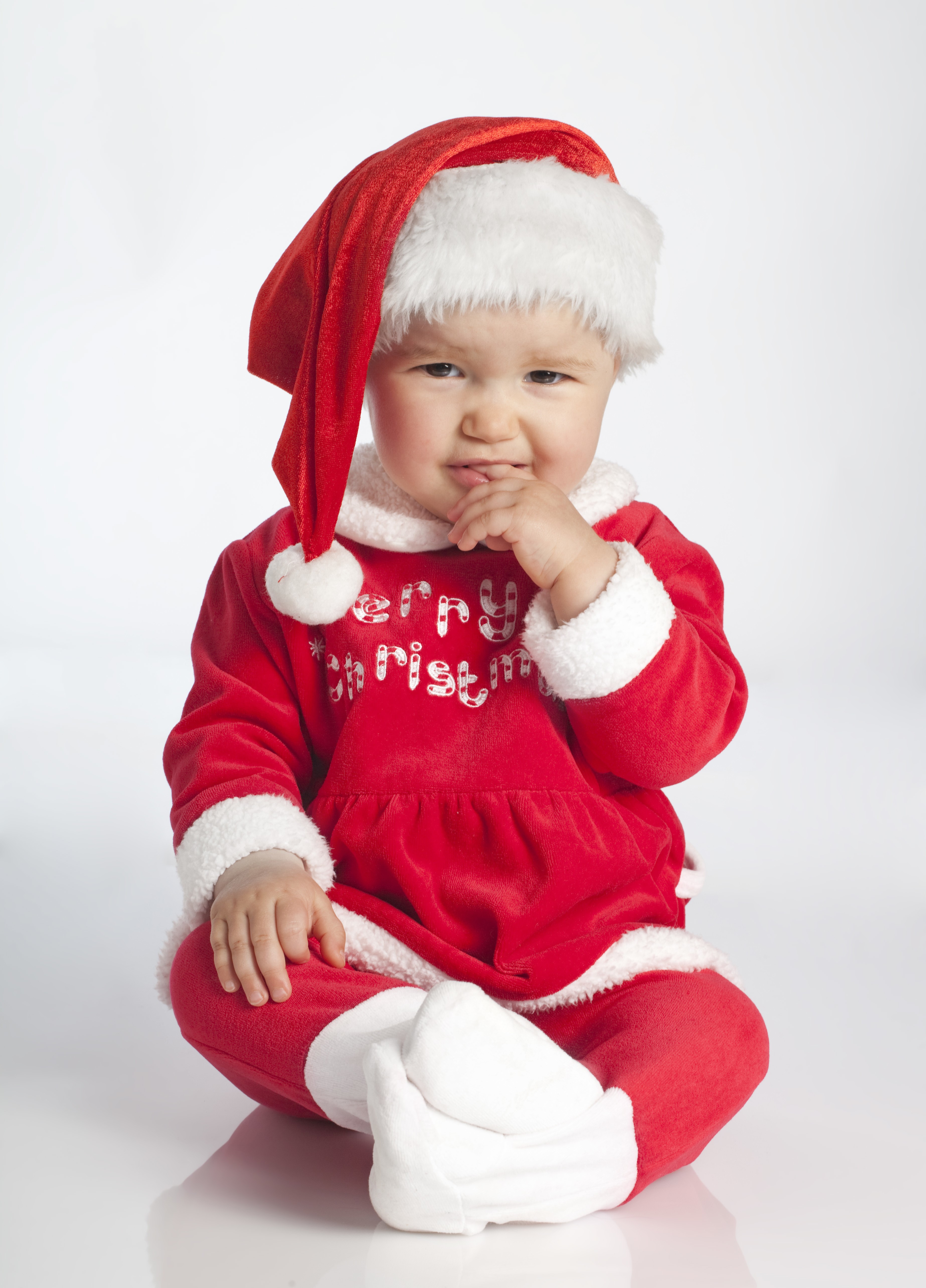 Baby in Santa costume with Christmas hat HD Phone Wallpaper