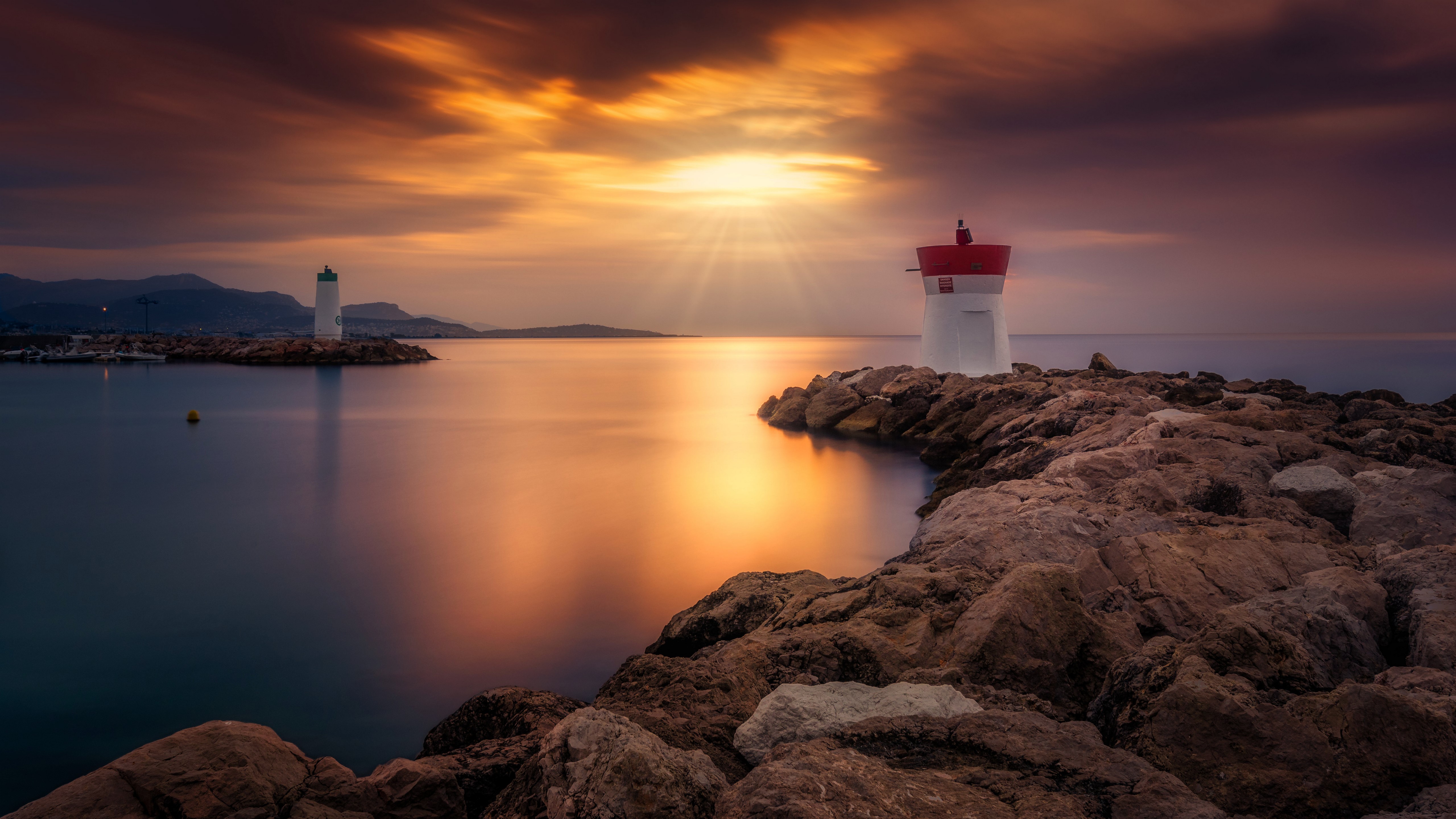 Lighthouses on rocky coast at sunset HD Wallpaper