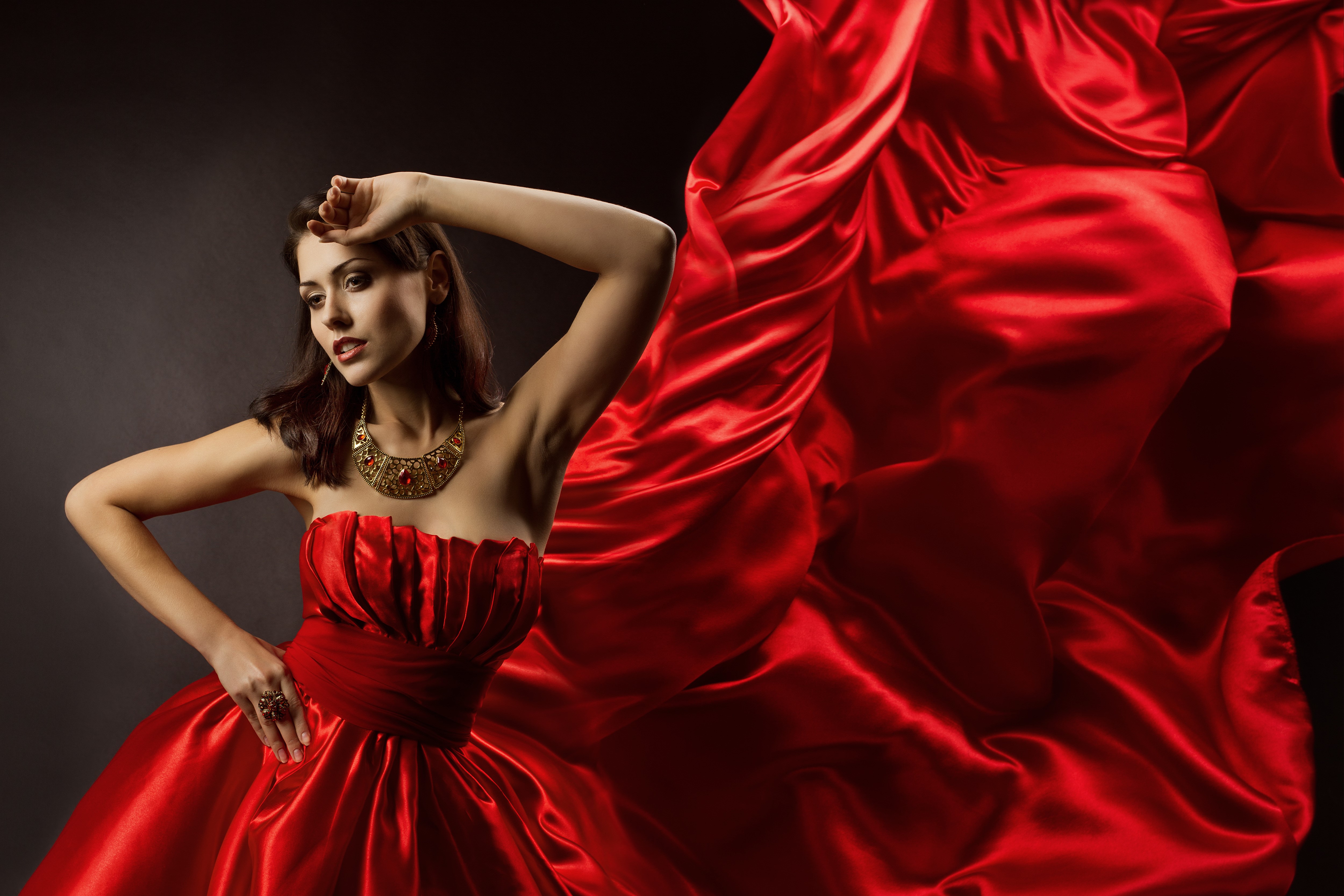 Woman in a red dress with jewelry HD Wallpaper