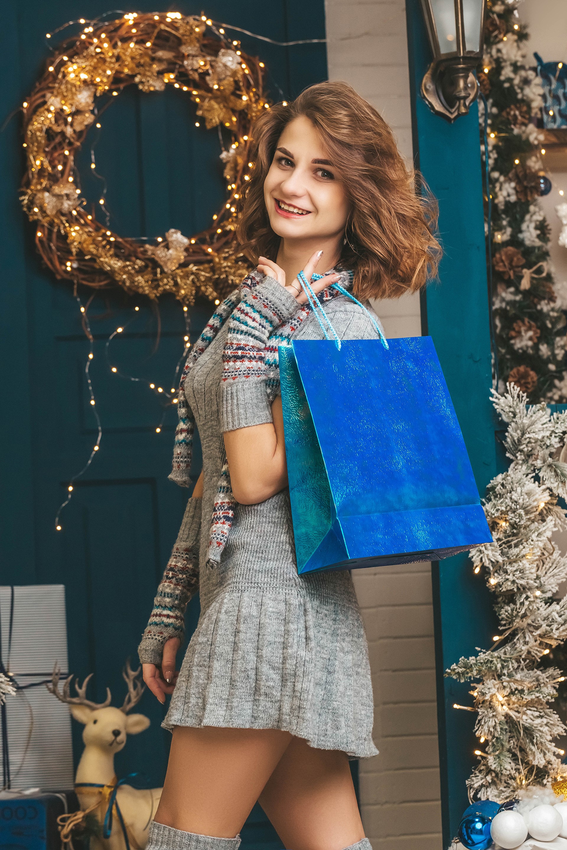 Woman with Christmas Gifts HD Phone Wallpaper