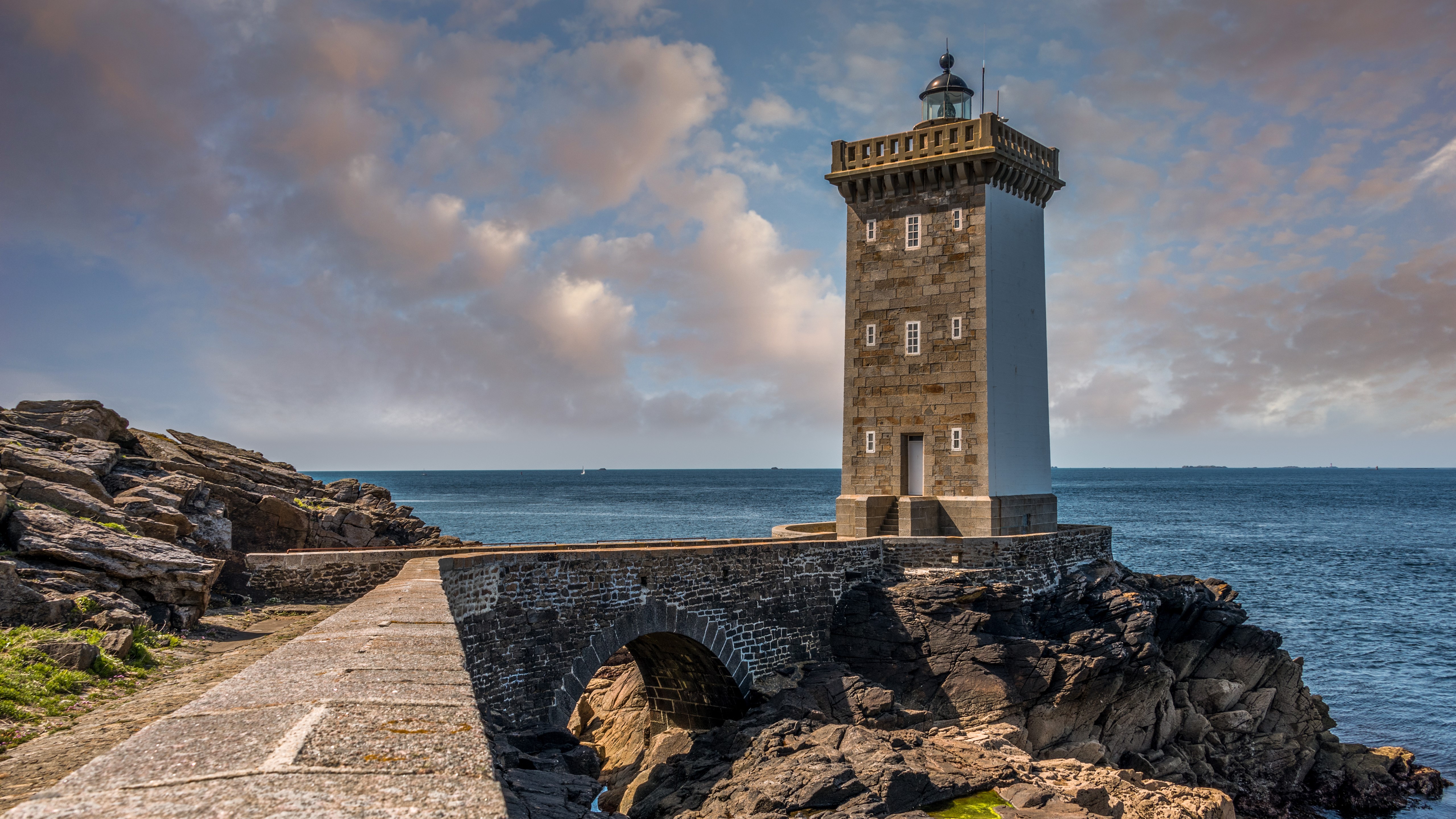 Kermovan Lighthouse on a Rocky Coast HD Wallpaper