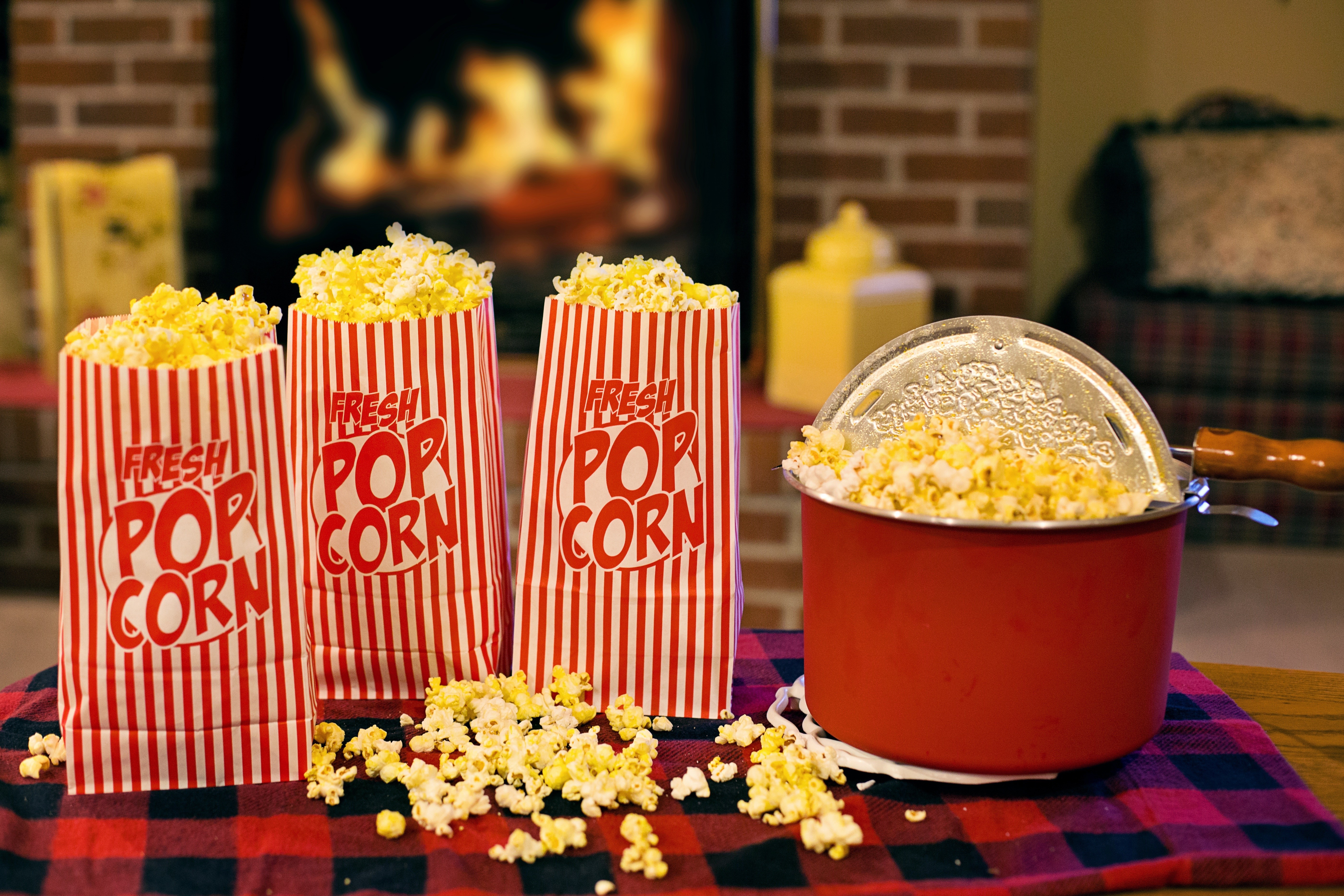 Popcorn bags and popcorn maker by fireplace HD Wallpaper