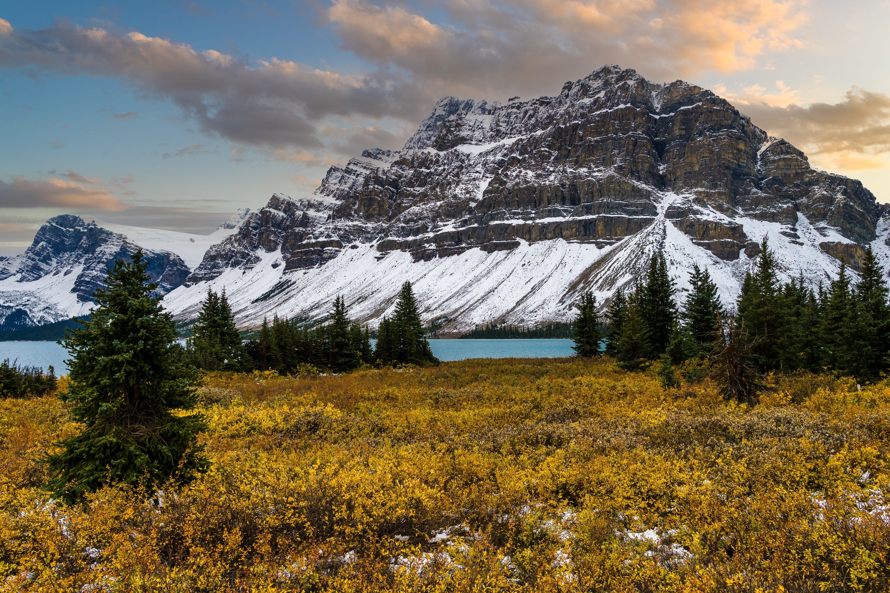 Snow-capped Rocky Mountains and autumn foliage in Canada HD Wallpaper