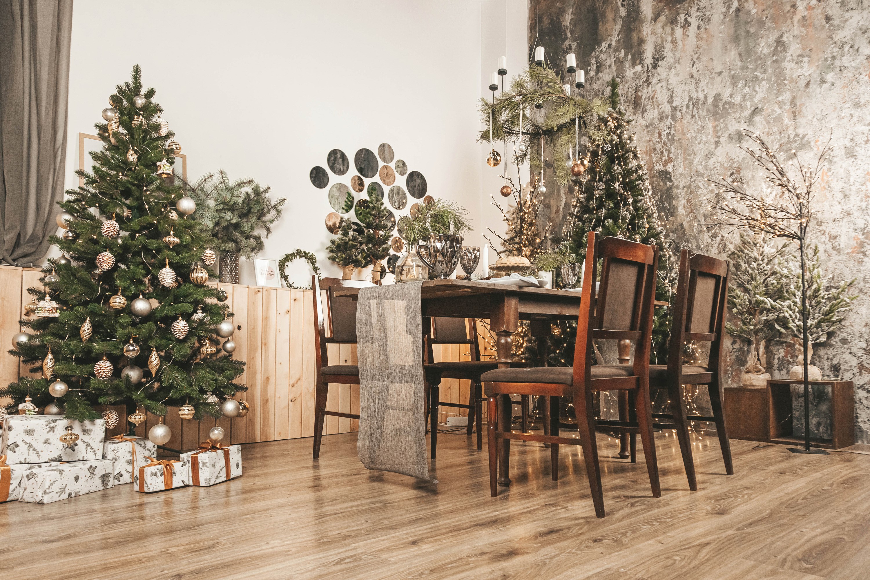 Christmas dining room with decorated trees and gifts HD Wallpaper