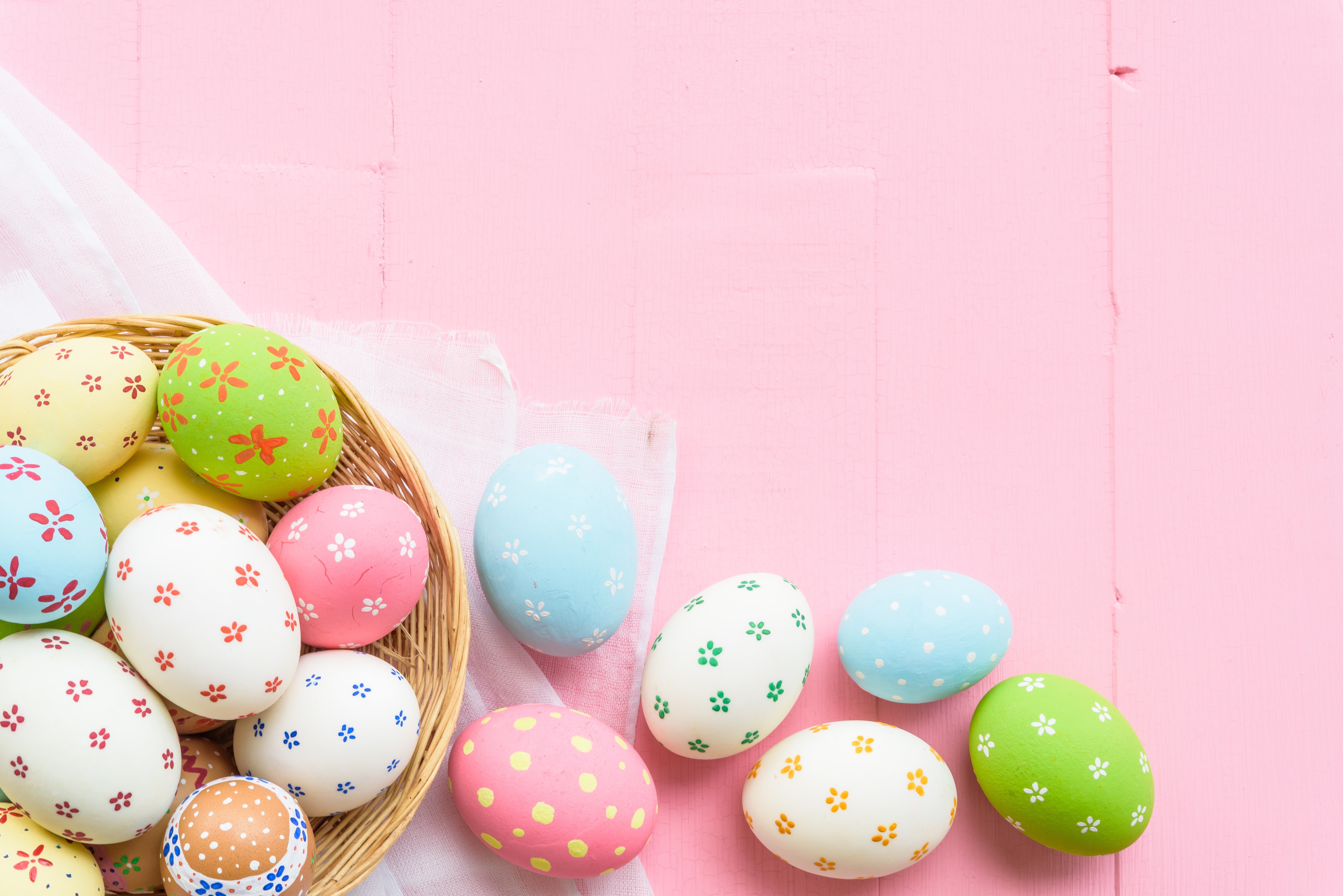 Easter Eggs in a Basket on Pink Background HD Wallpaper