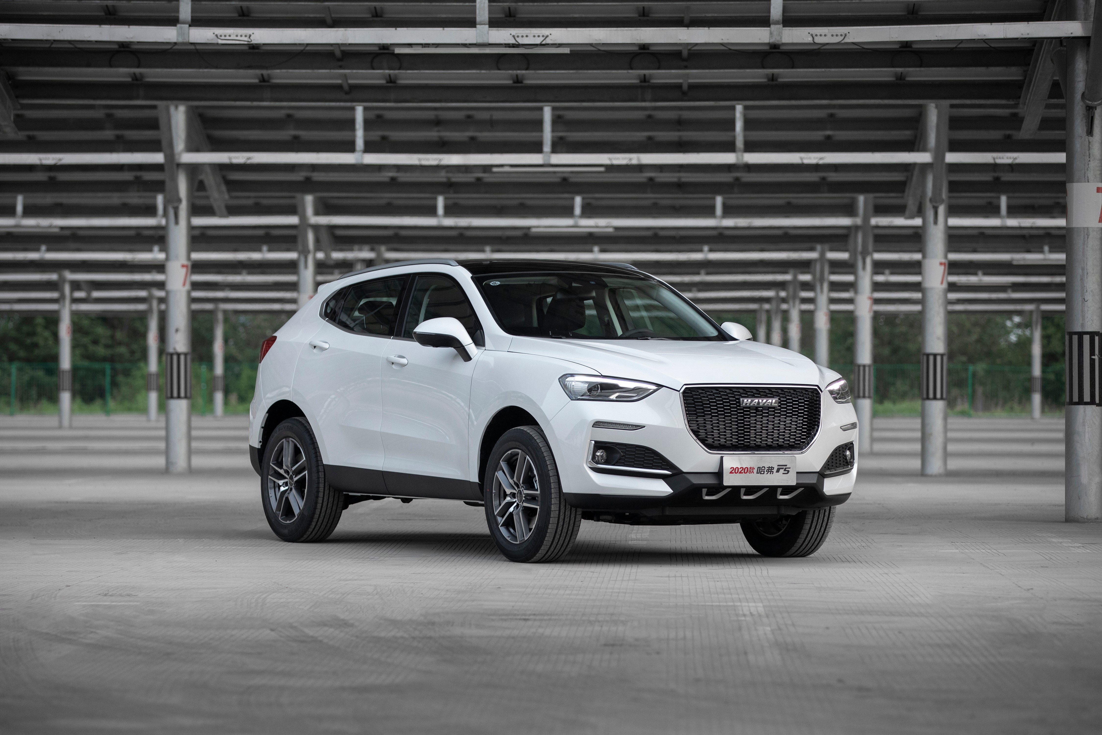 White Haval F5 Crossover parked under solar panel structure HD Wallpaper