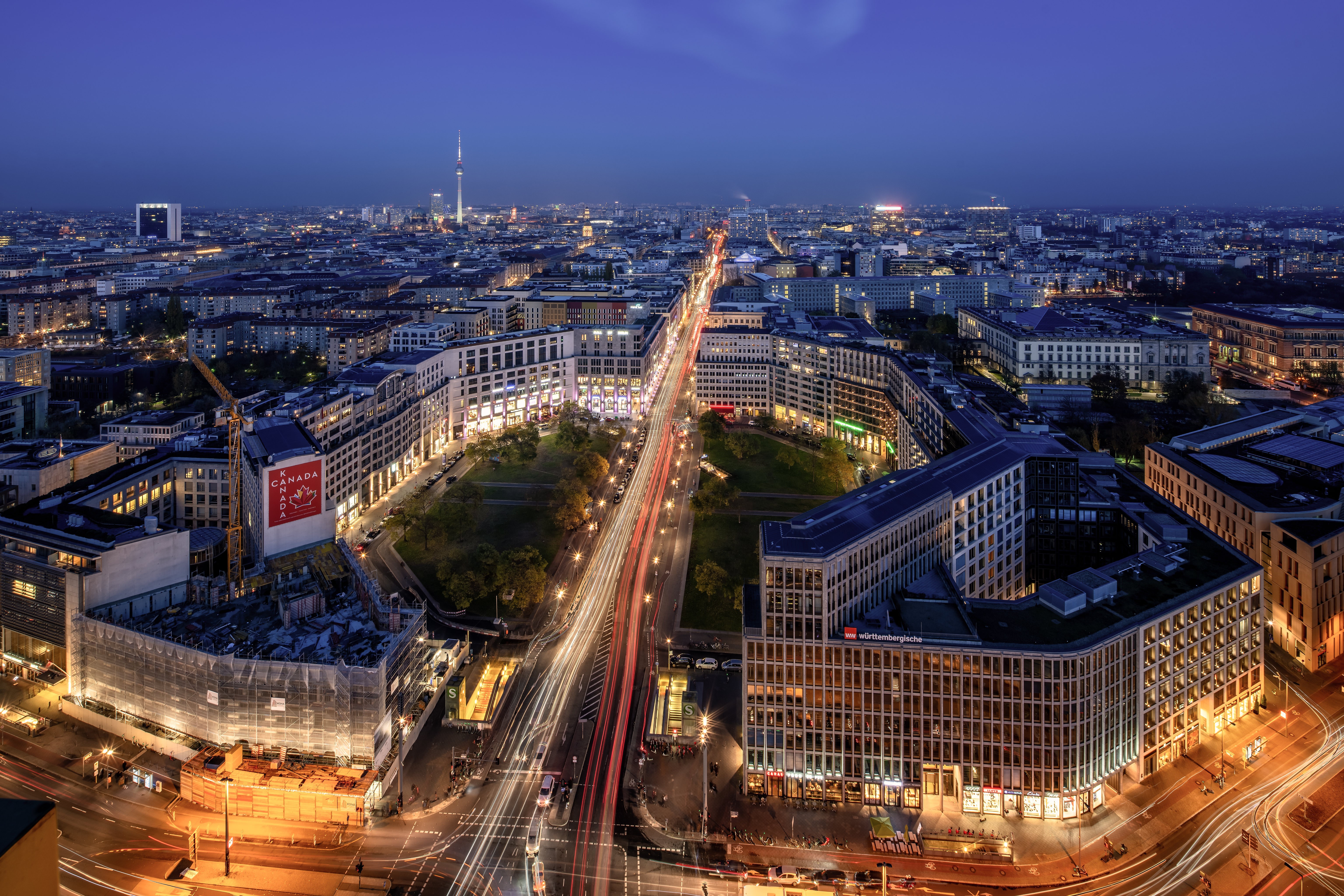 Berlin cityscape at night with light trails from above HD Wallpaper