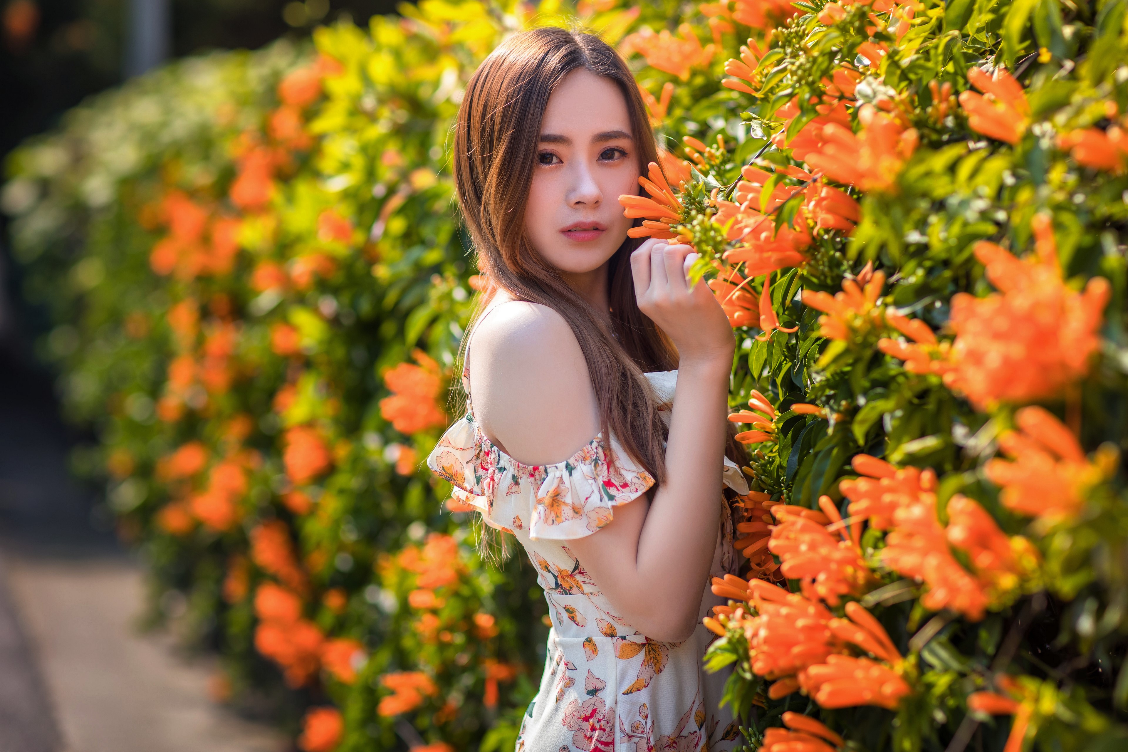 4K Asian Woman in Floral Dress with Orange Flowers HD Wallpaper