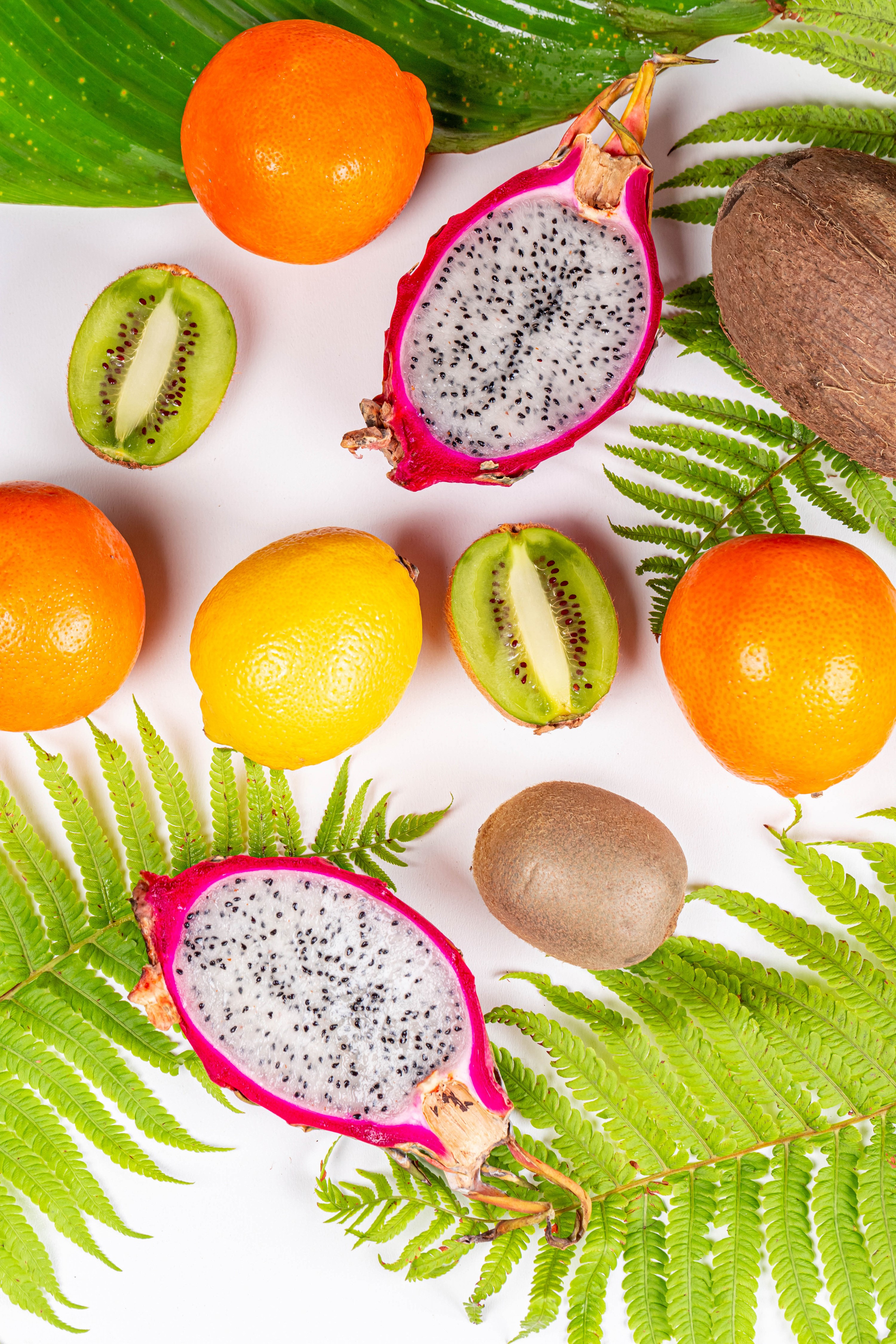 Assortment of tropical fruits and ferns HD Phone Wallpaper