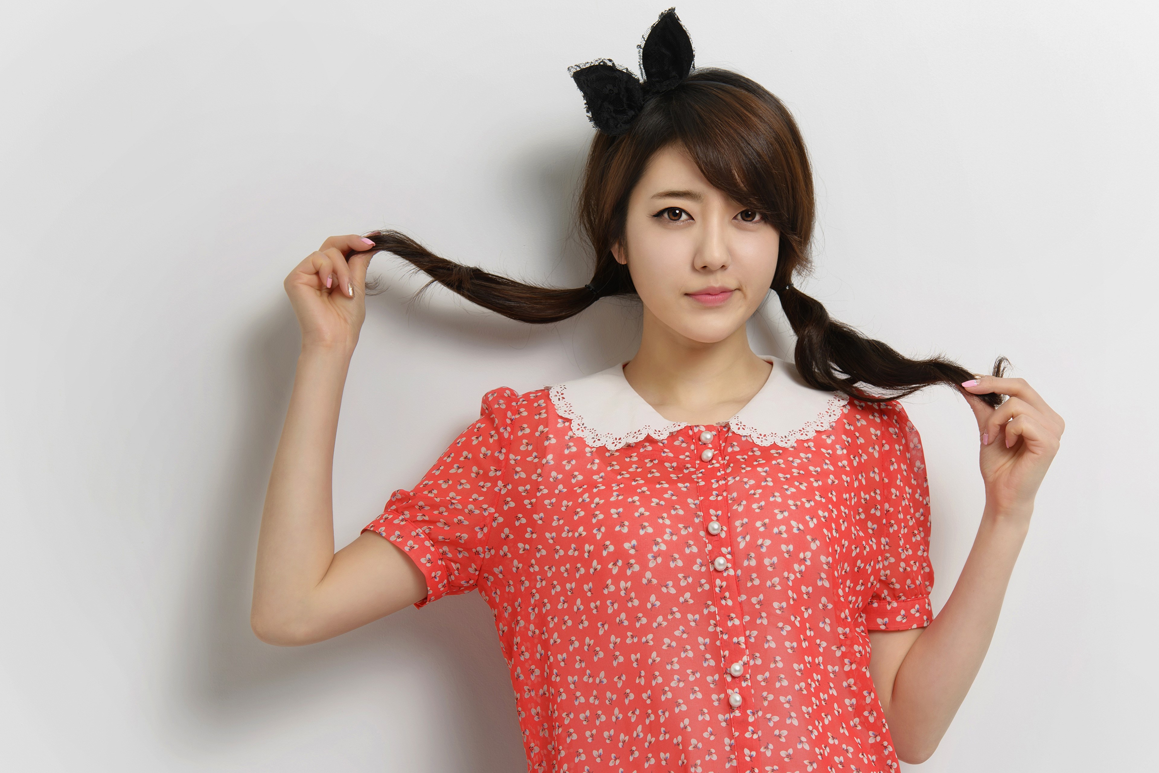 Asian woman with pigtails and red dress HD Wallpaper