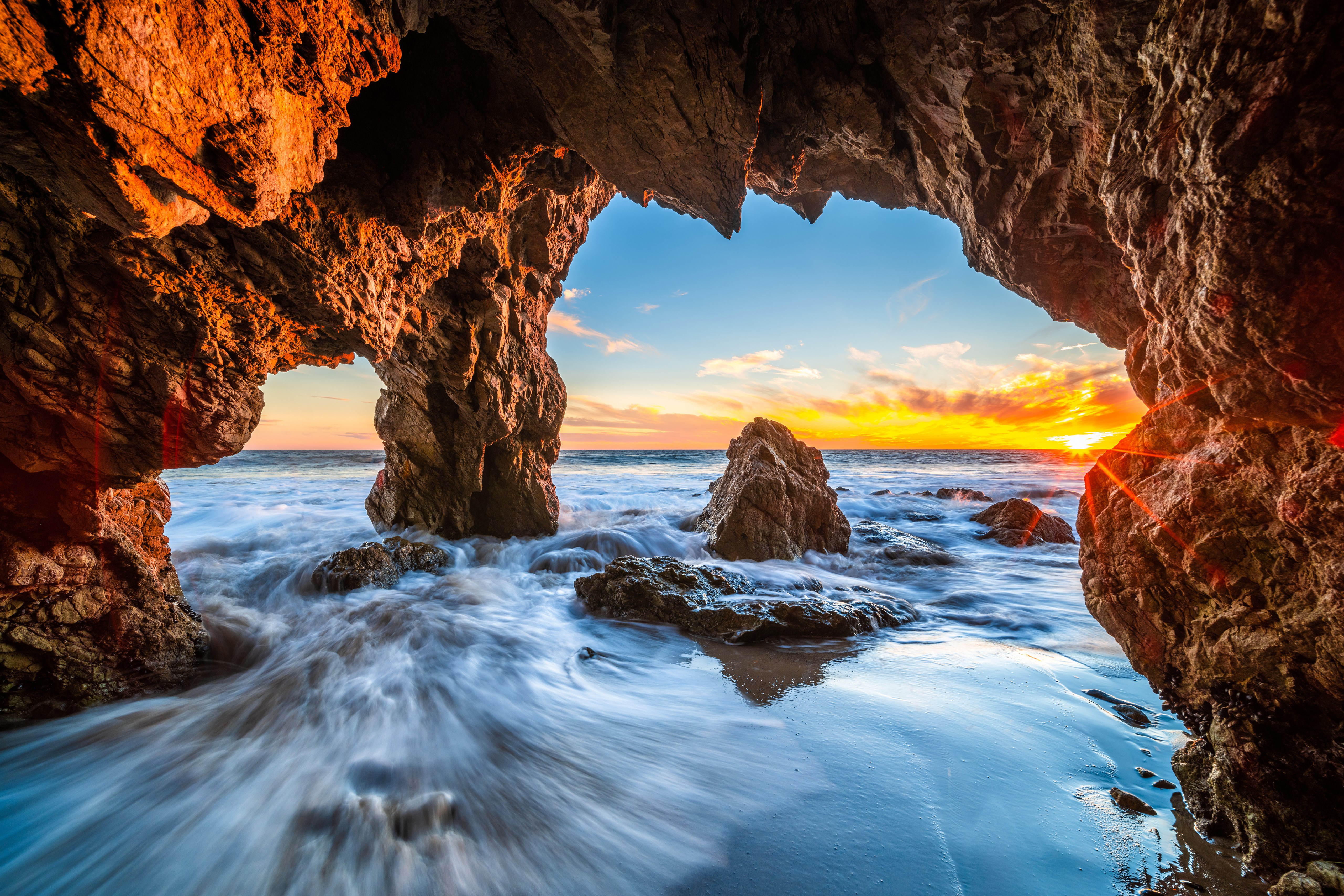 Cave entrance at El Matador Beach, California during sunset HD Wallpaper