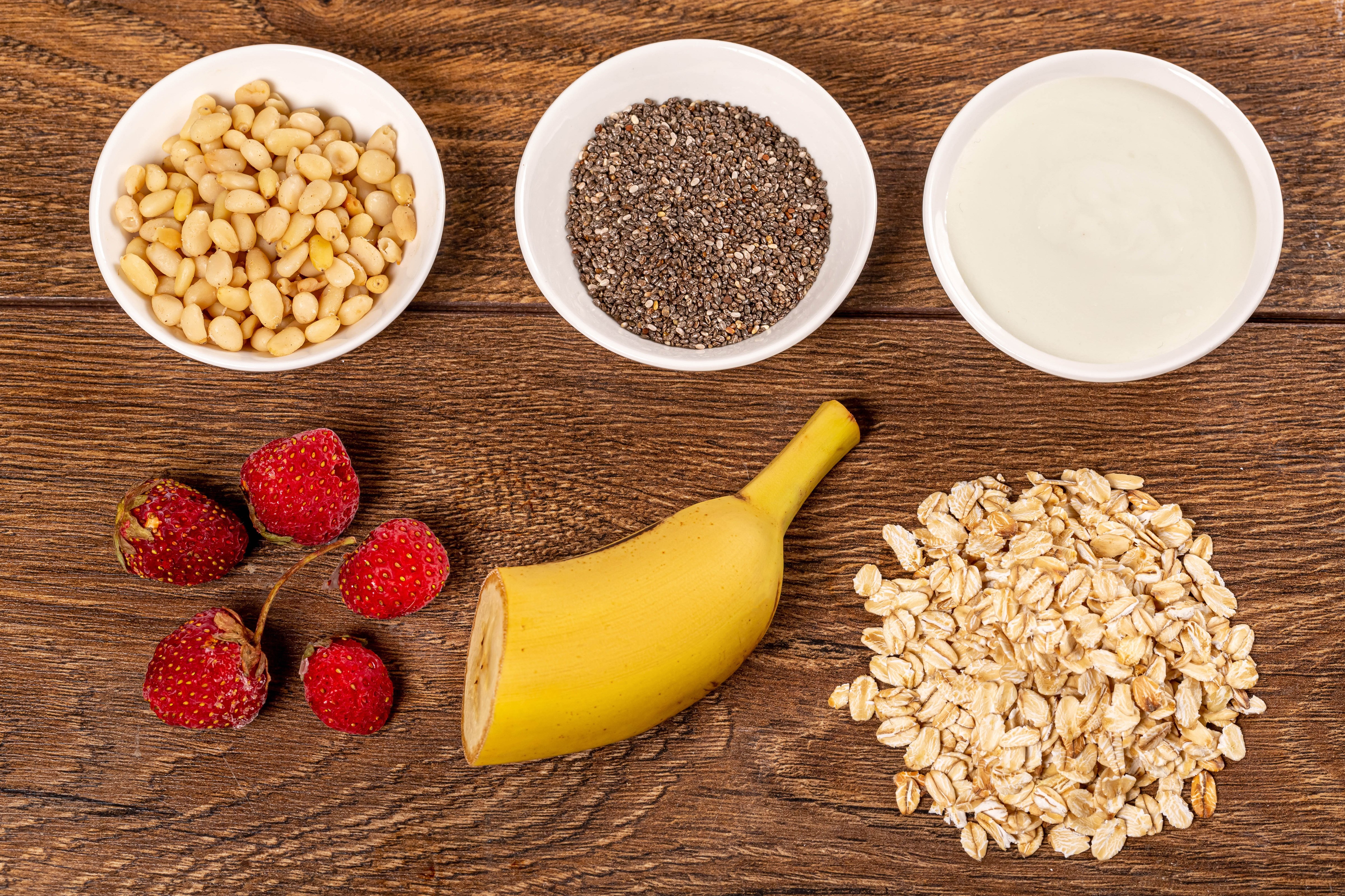 Oatmeal with Nuts, Strawberries, Banana, and Yogurt HD Wallpaper