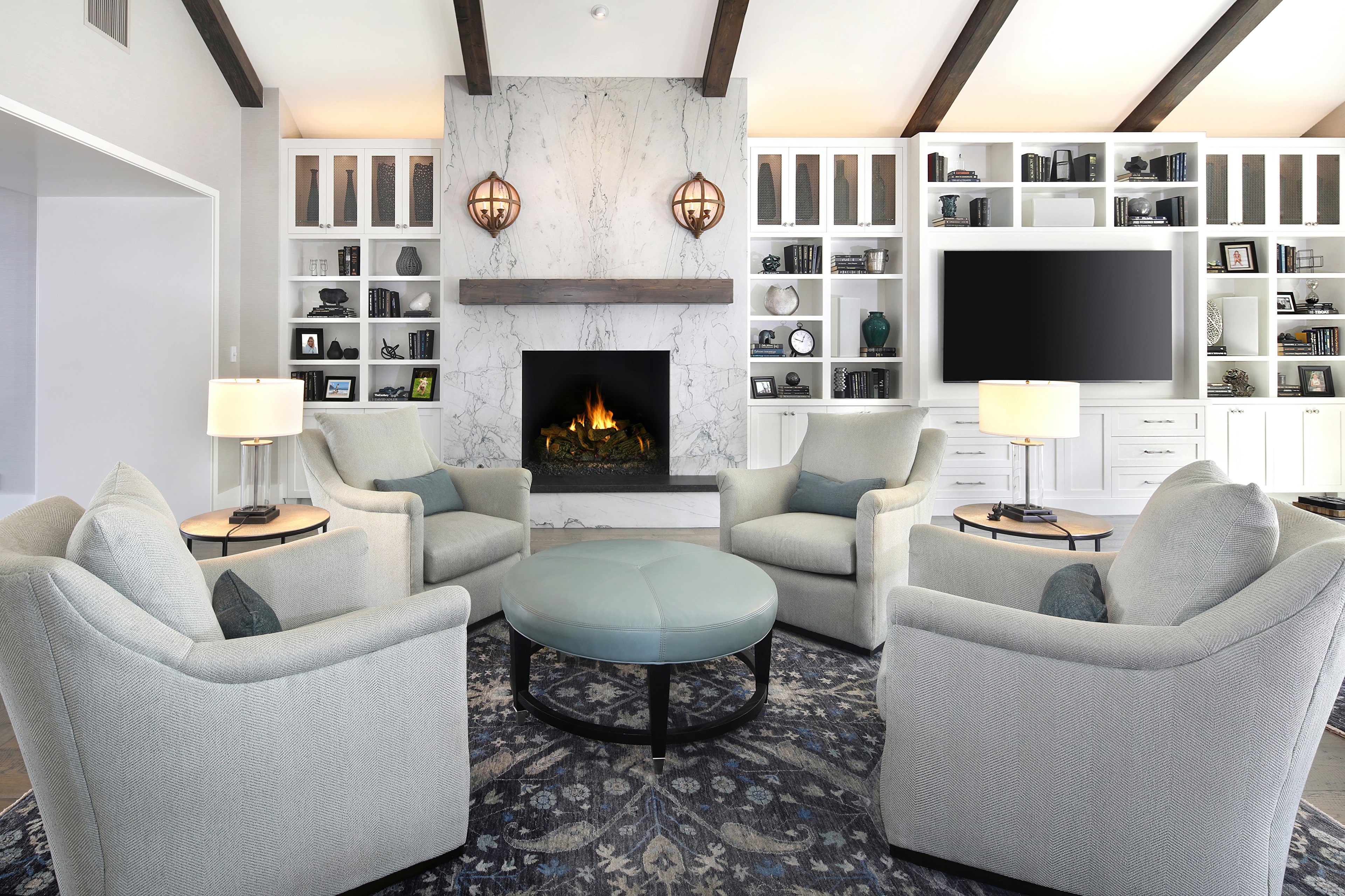 Living room with fireplace and armchairs HD Wallpaper