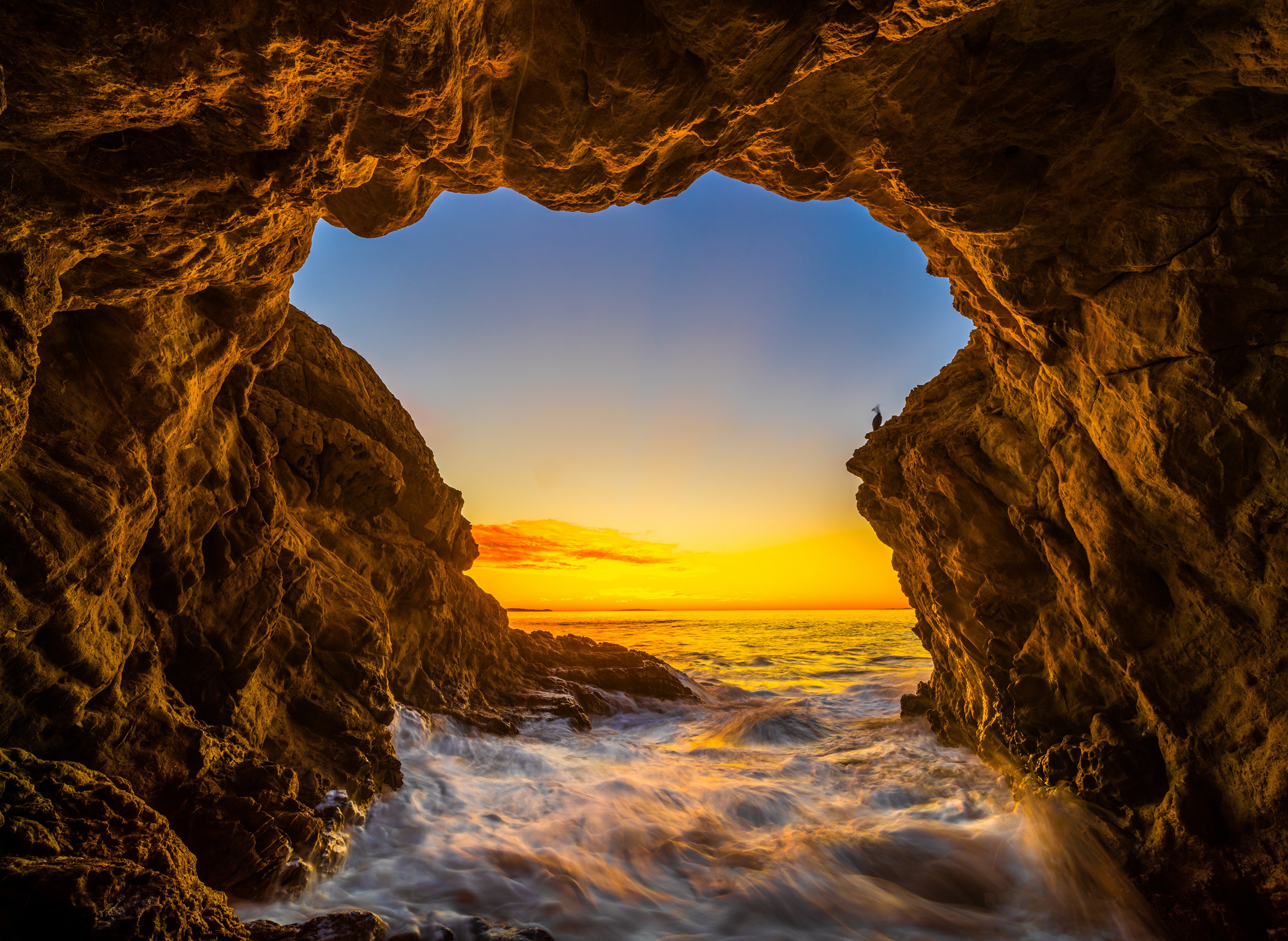 Cave entrance at El Matador Beach, California during sunset HD Wallpaper