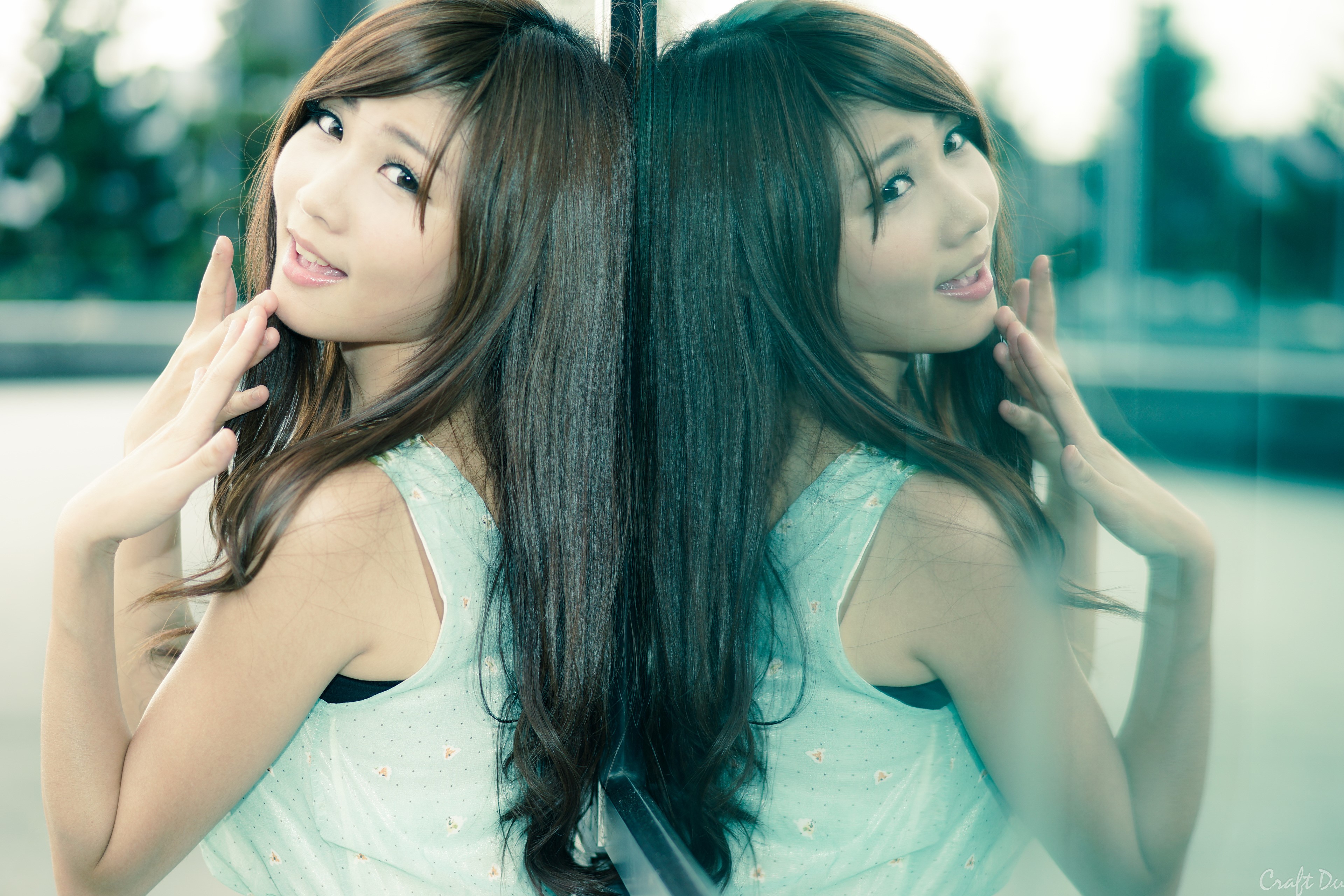 Asian woman with brown hair reflected HD Wallpaper