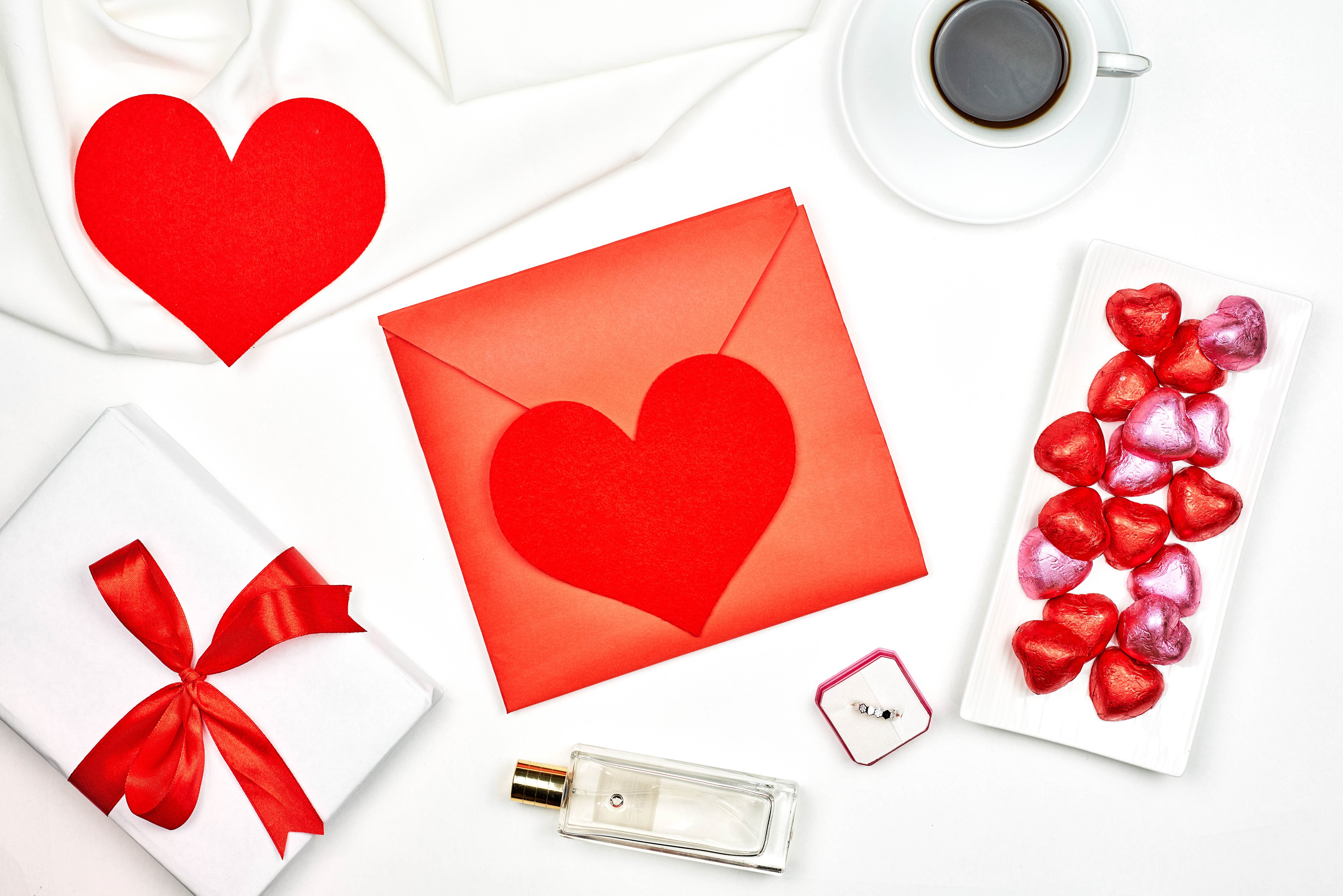 Valentine's Day gift with coffee, perfume, and chocolates HD Wallpaper
