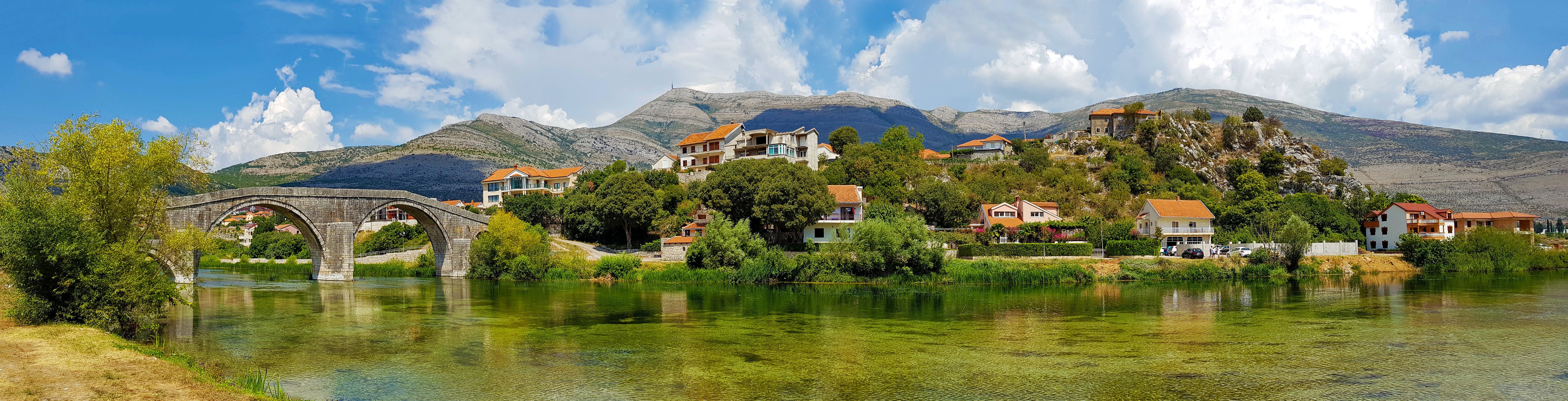 Panorama of Trebinje, Bosnia and Herzegovina with bridge and river HD Wallpaper
