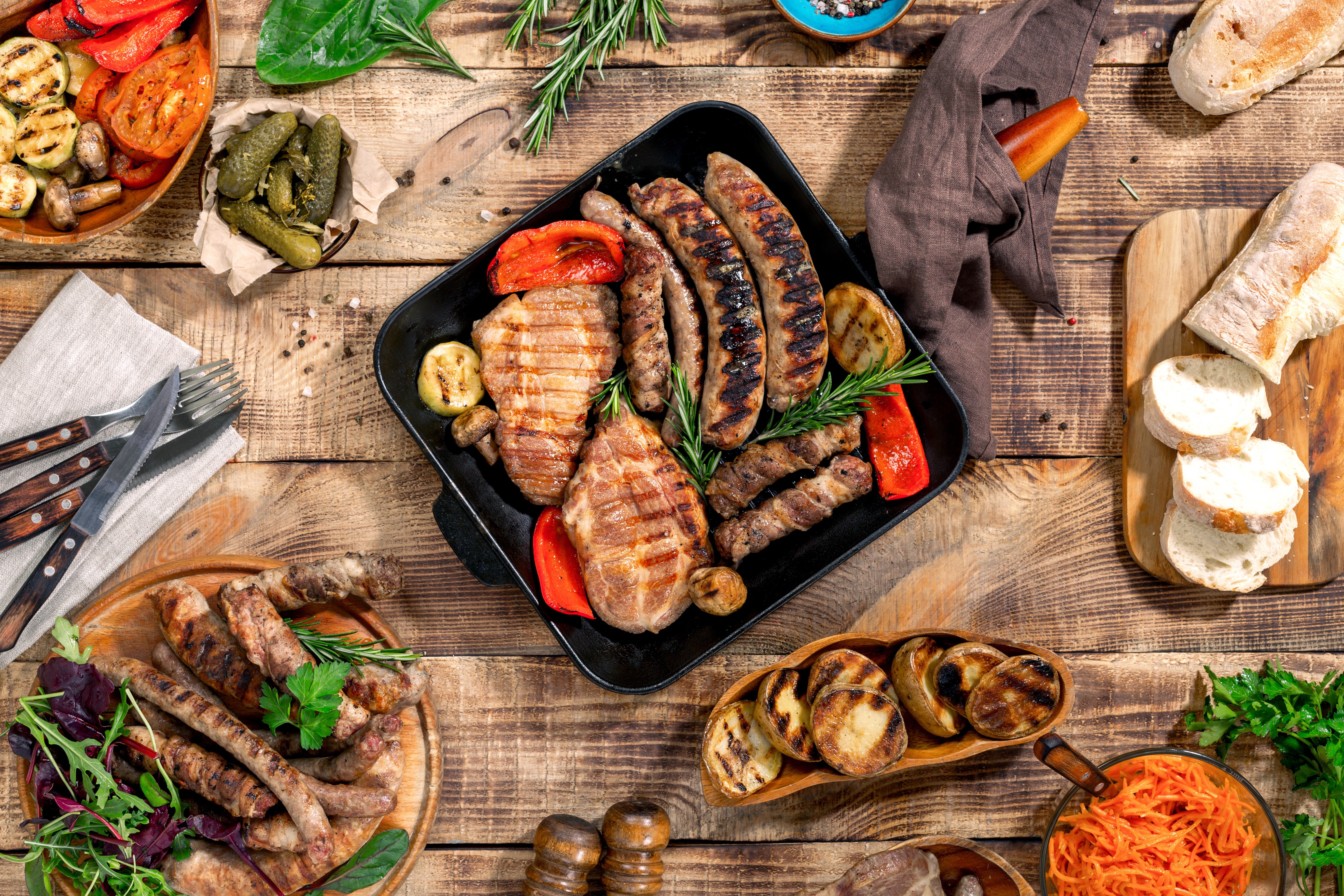 Grilled Meats and Vegetables with Bread and Pickles HD Wallpaper