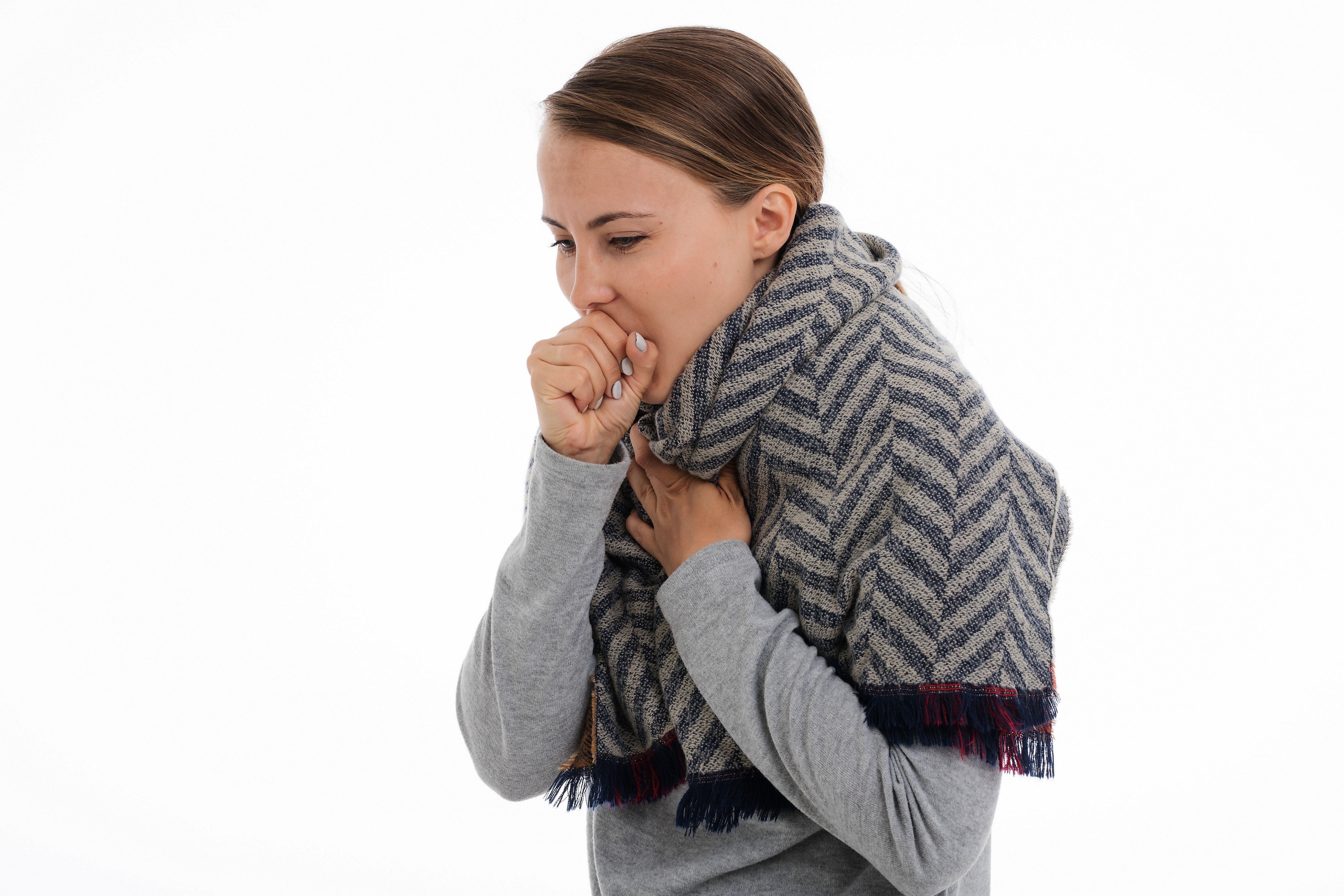 Woman with scarf coughing on white background HD Wallpaper
