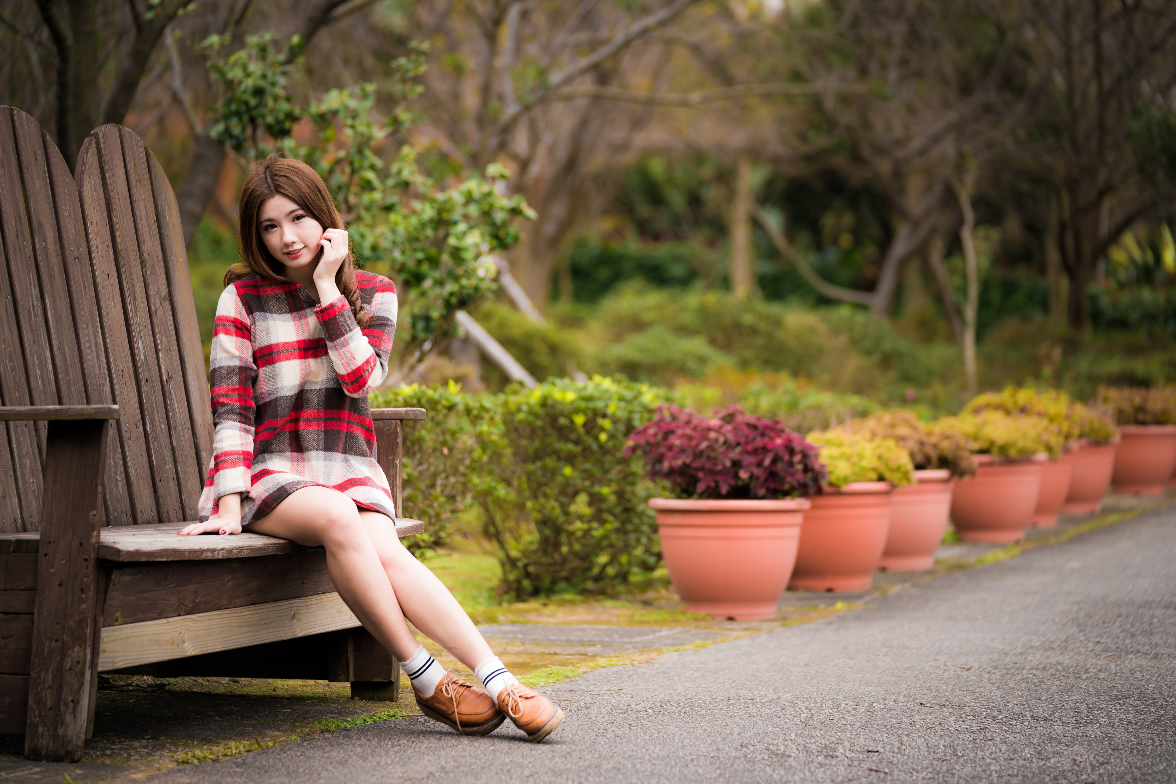 4K Asian Woman Sitting on Wooden Bench HD Wallpaper
