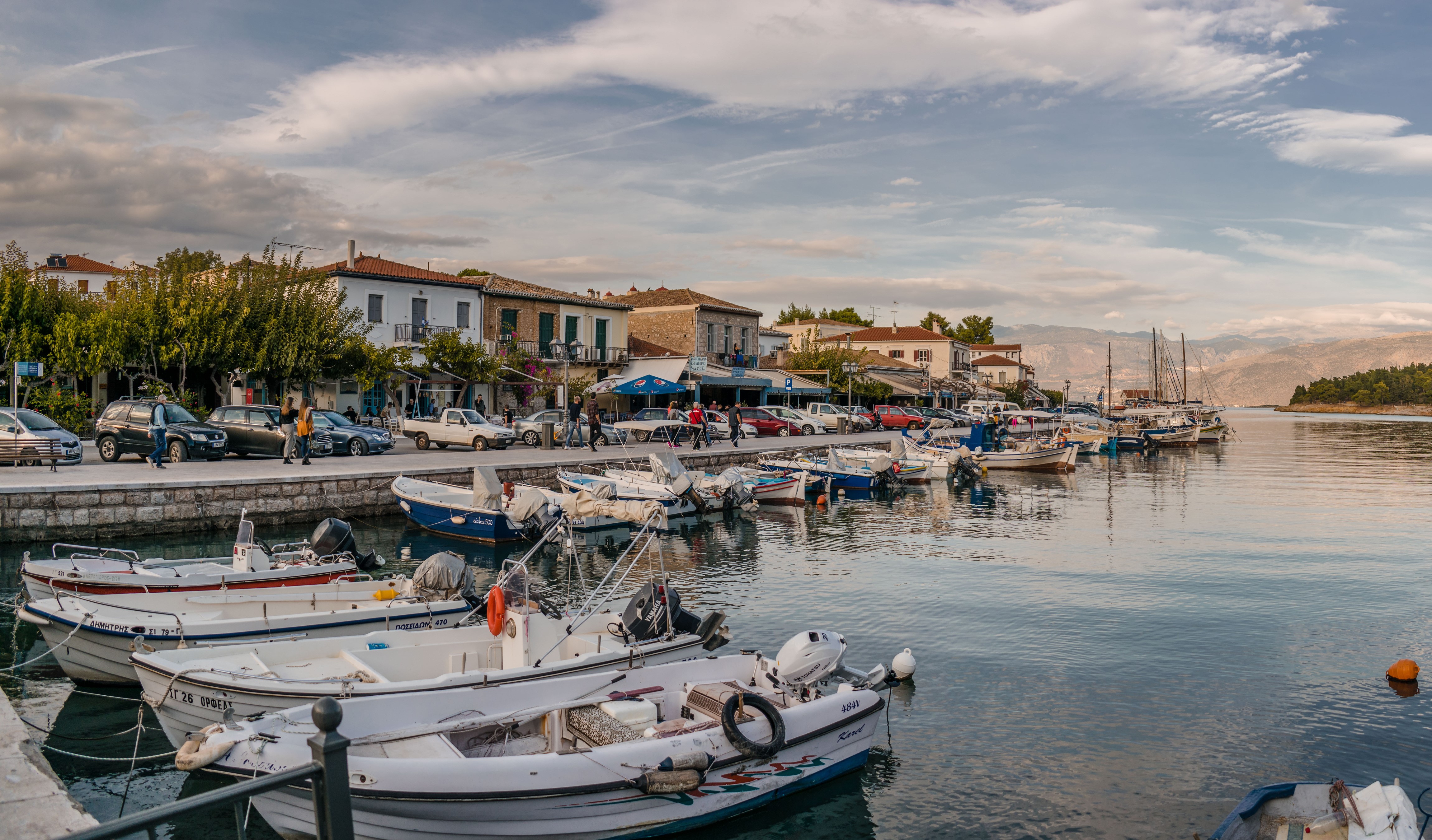 Boats docked in a harbor in Galaxidi, Greece HD Wallpaper