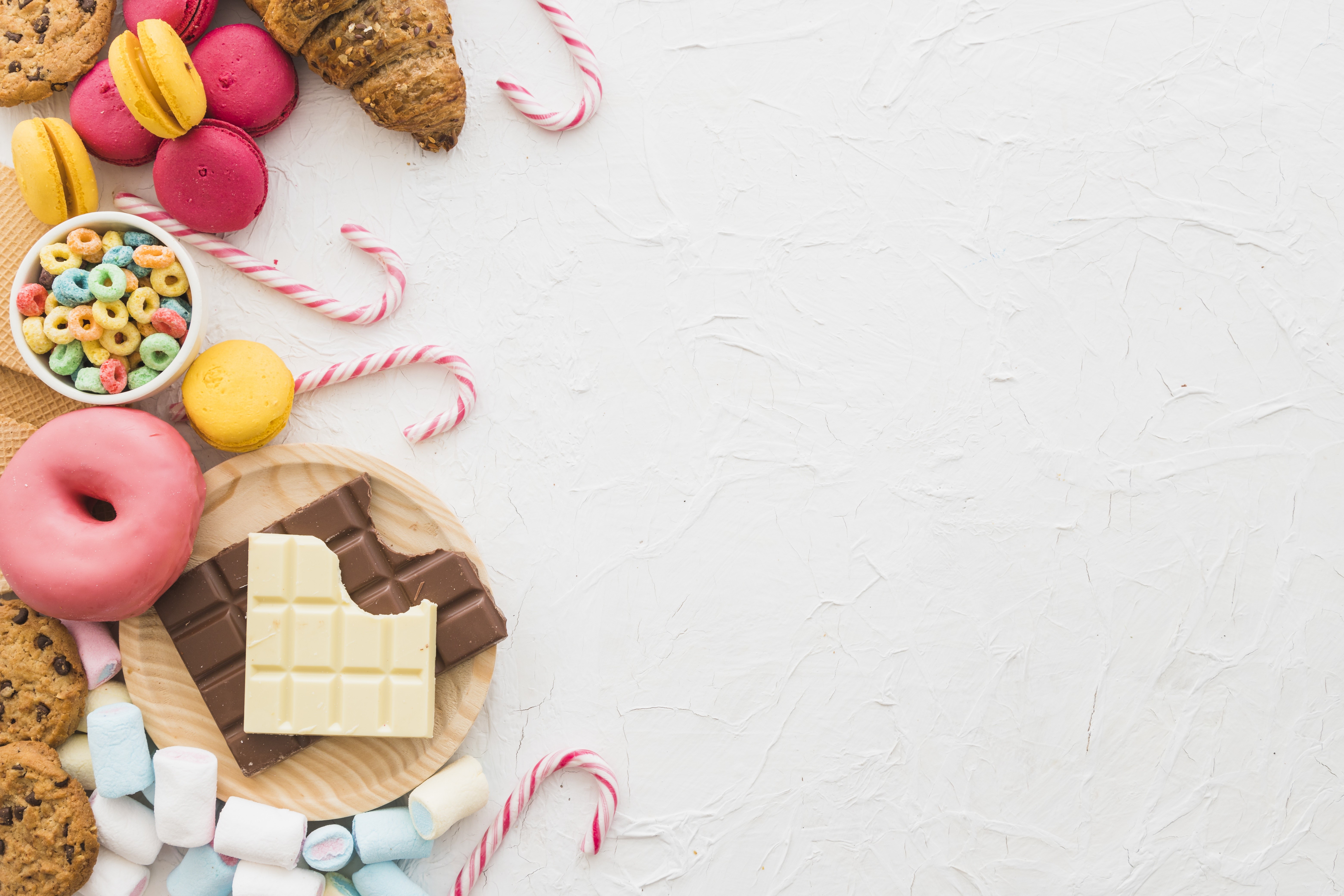 Sweets and chocolates on a white background HD Wallpaper