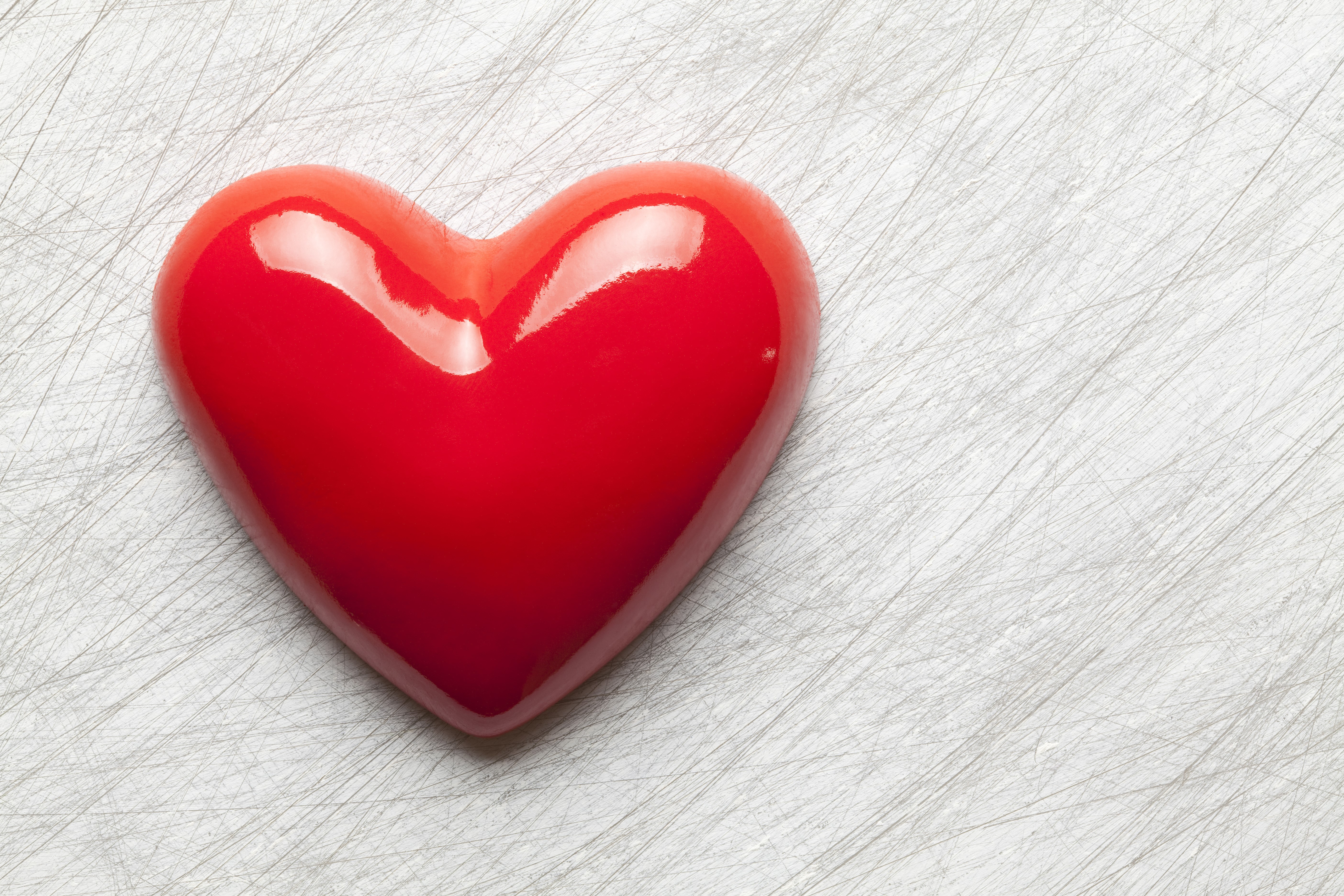 Red Heart on Textured Surface HD Wallpaper