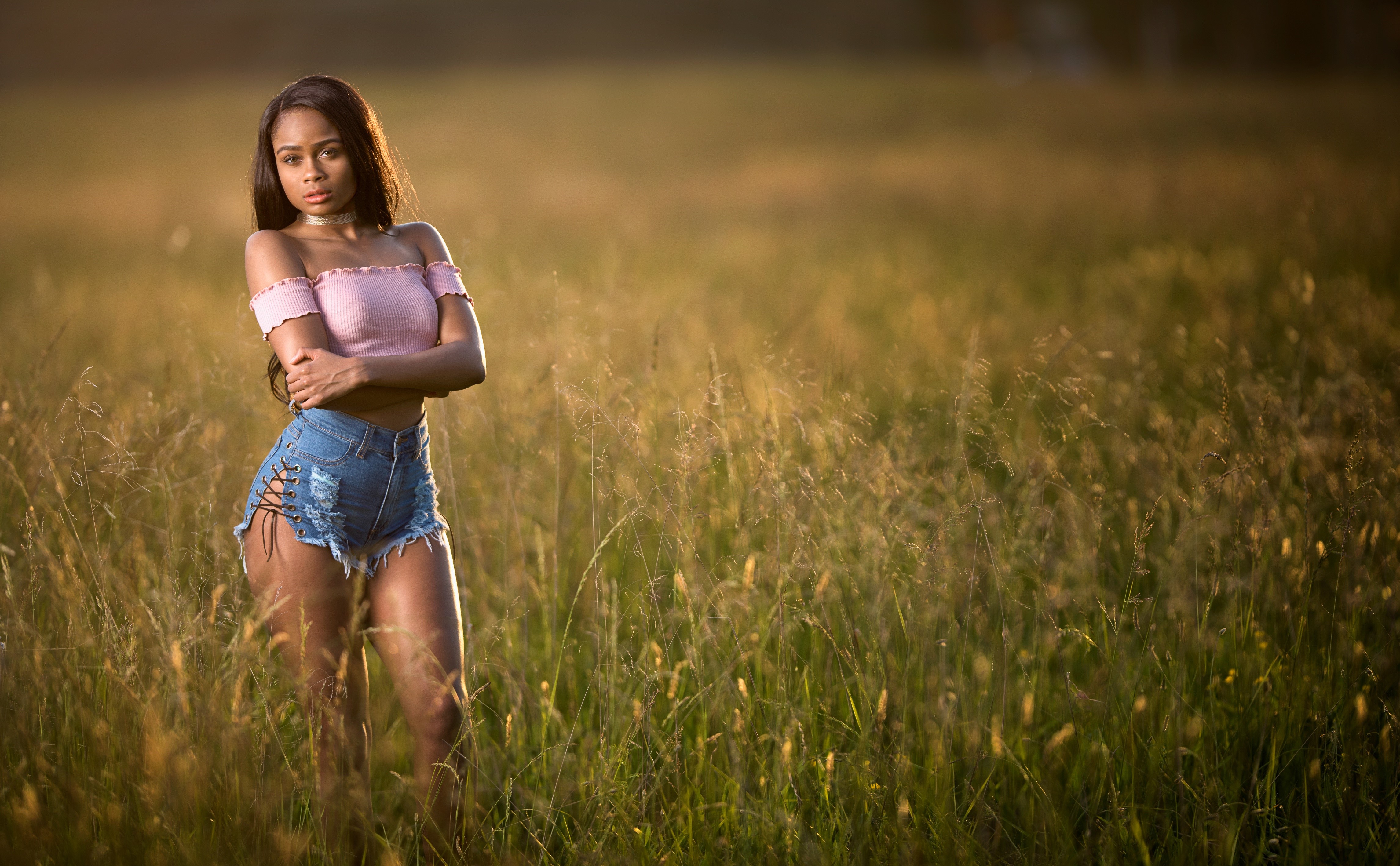 4K Brunette Girl in Grass Field with Bokeh HD Wallpaper