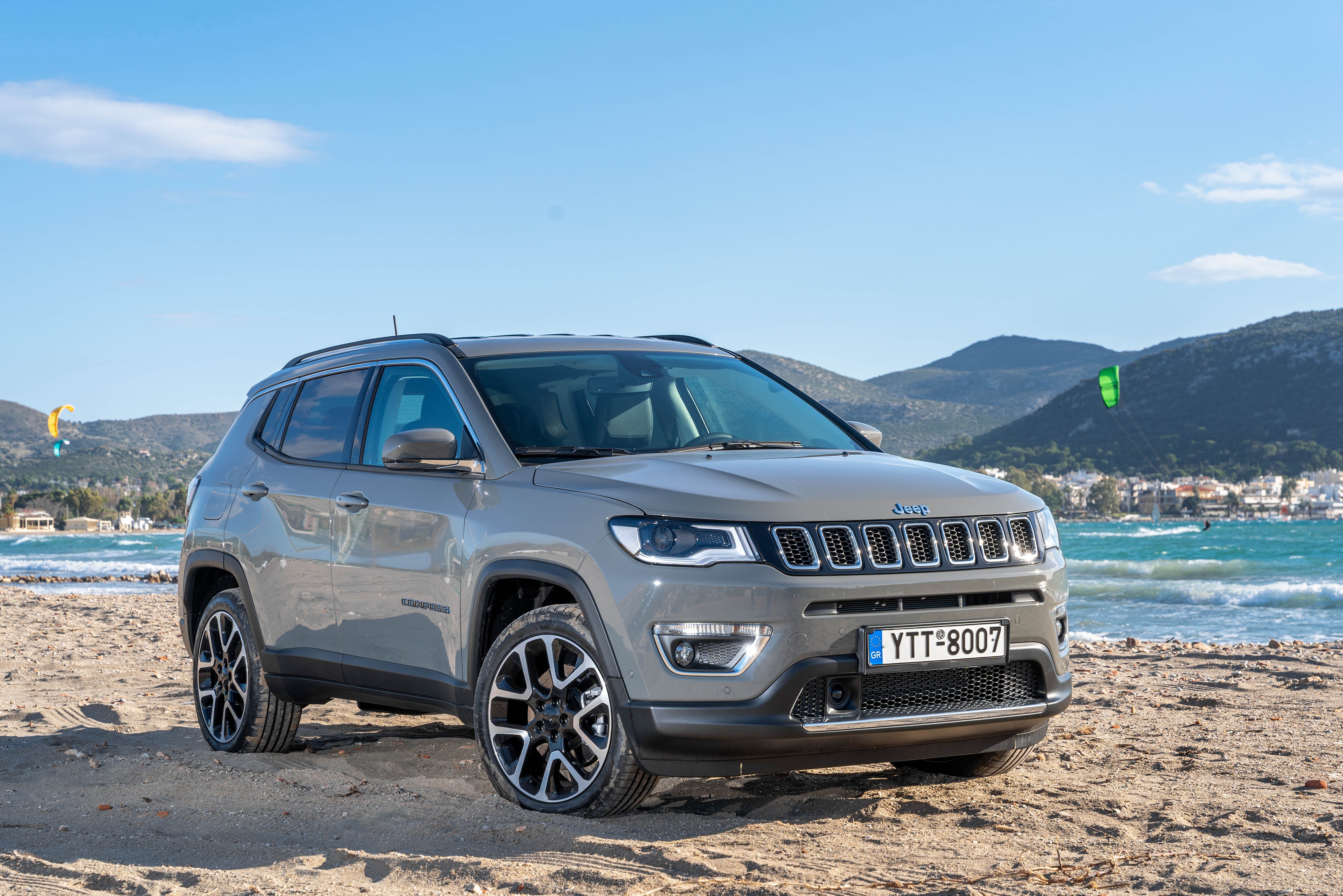 Grey Jeep Compass Limited 4xe on a beach HD Wallpaper