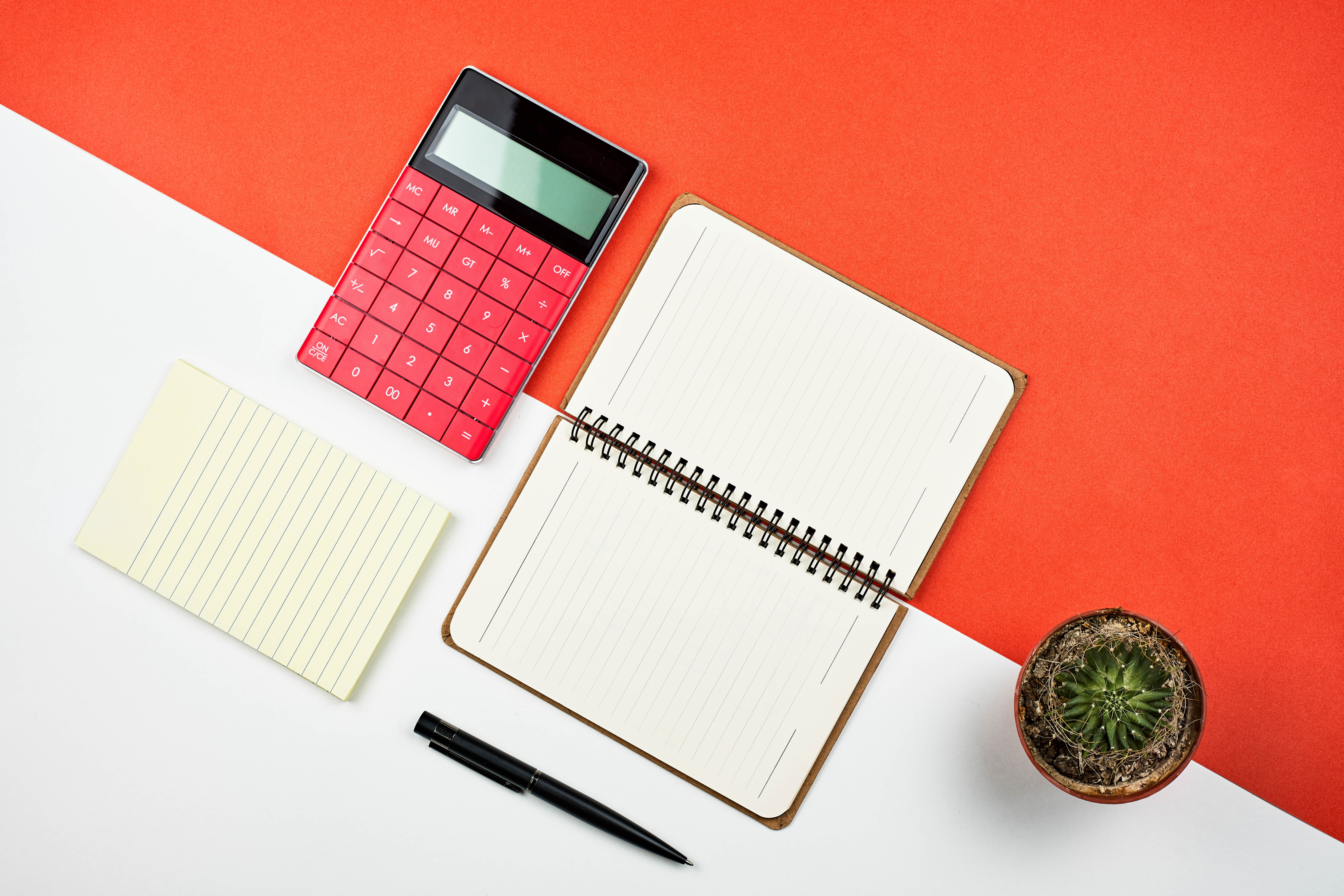 Red calculator, notebook, pen, notepad, and cactus HD Wallpaper