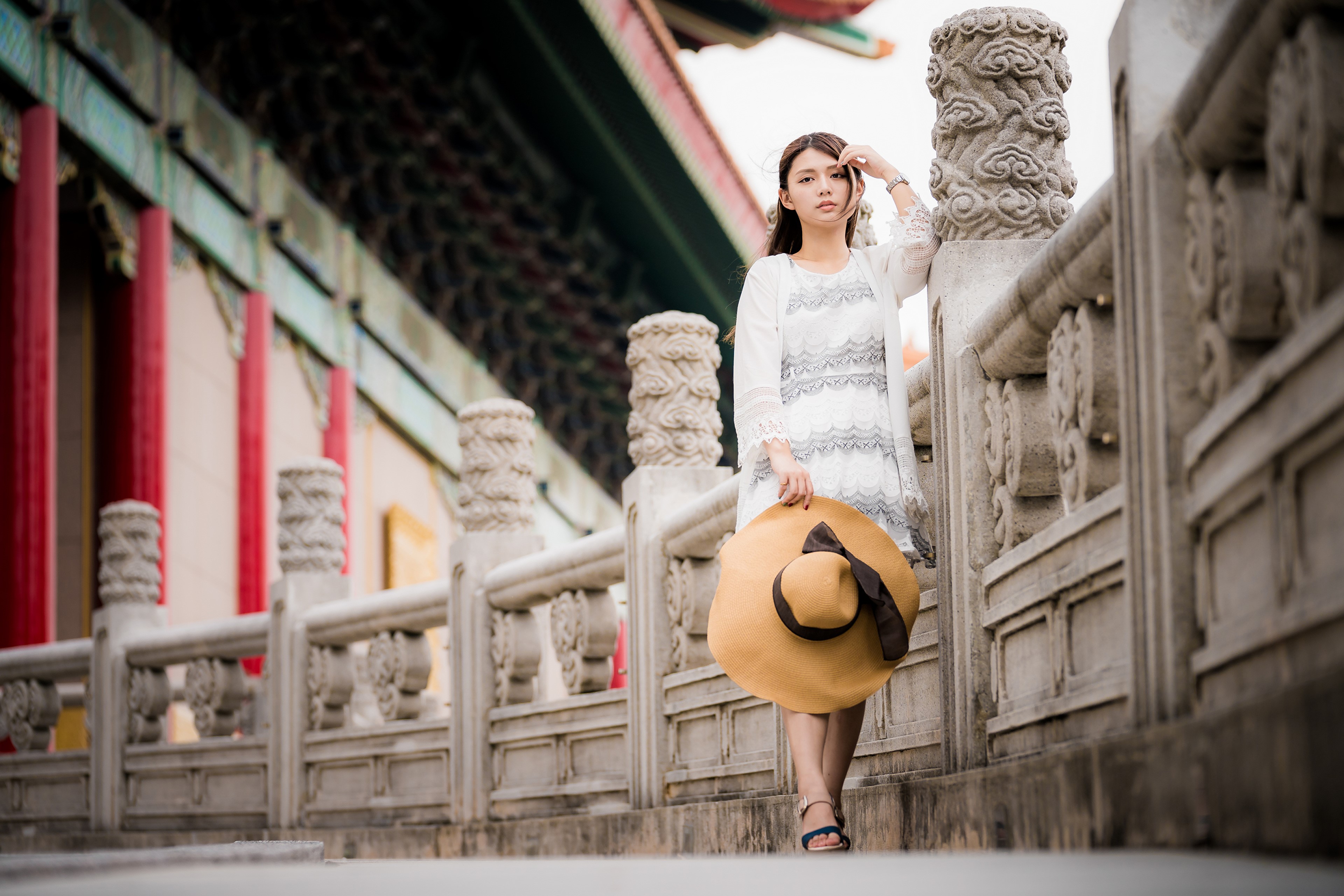 Asian woman with hat in front of traditional building HD Wallpaper
