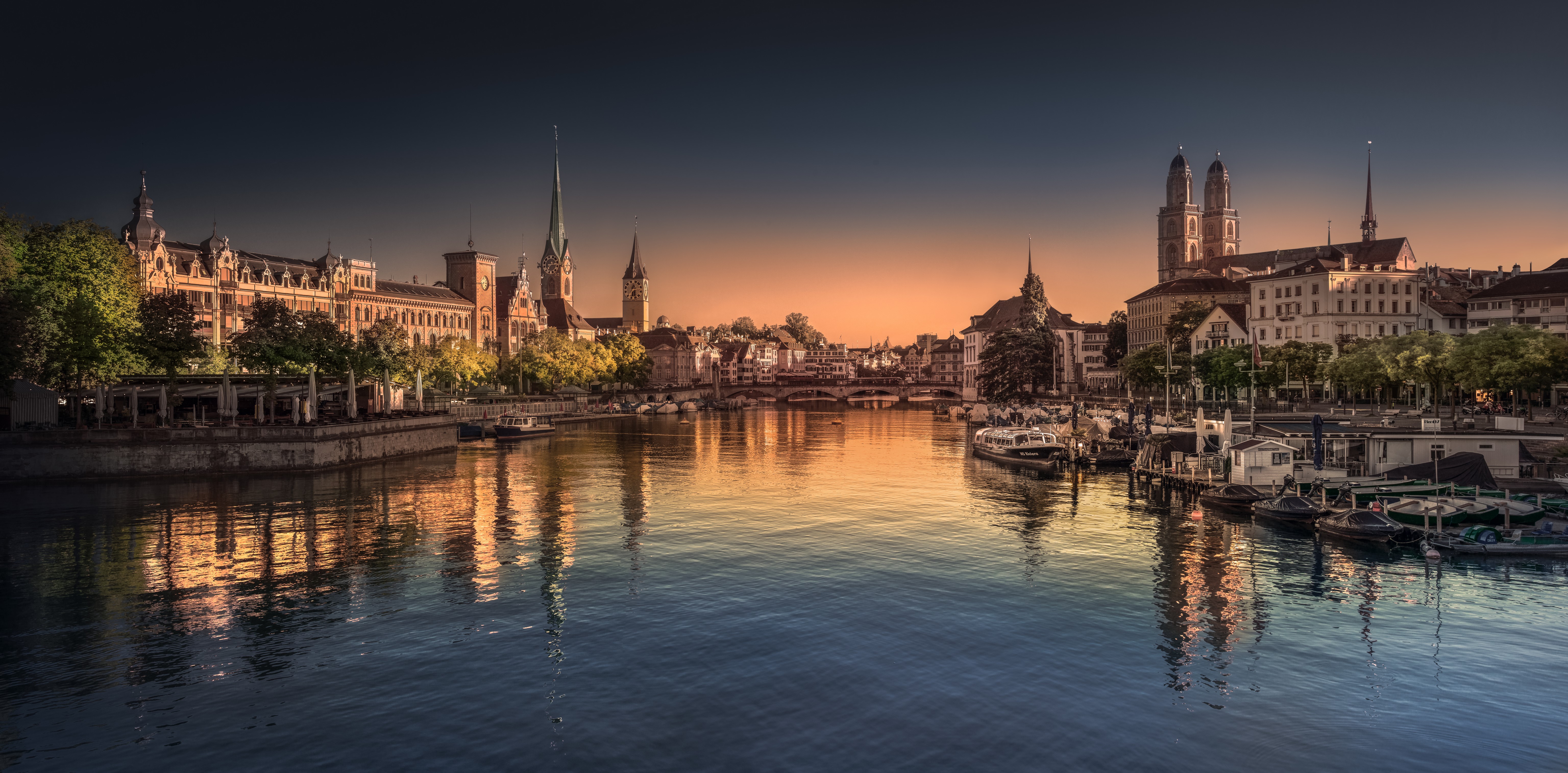 Zurich panorama with river and historic buildings at sunrise HD Wallpaper