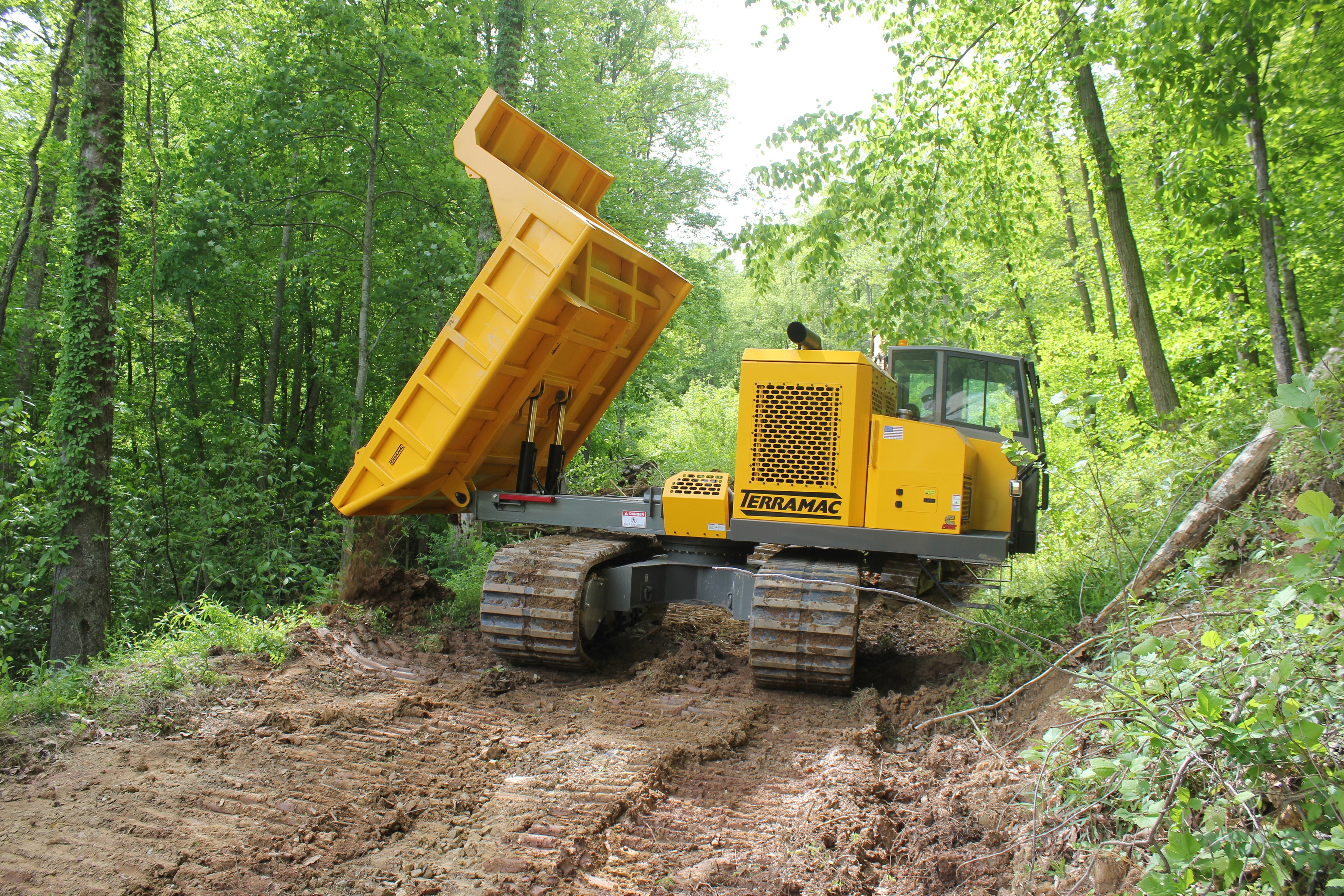 Terramac RT14R articulated dump truck in forest HD Wallpaper