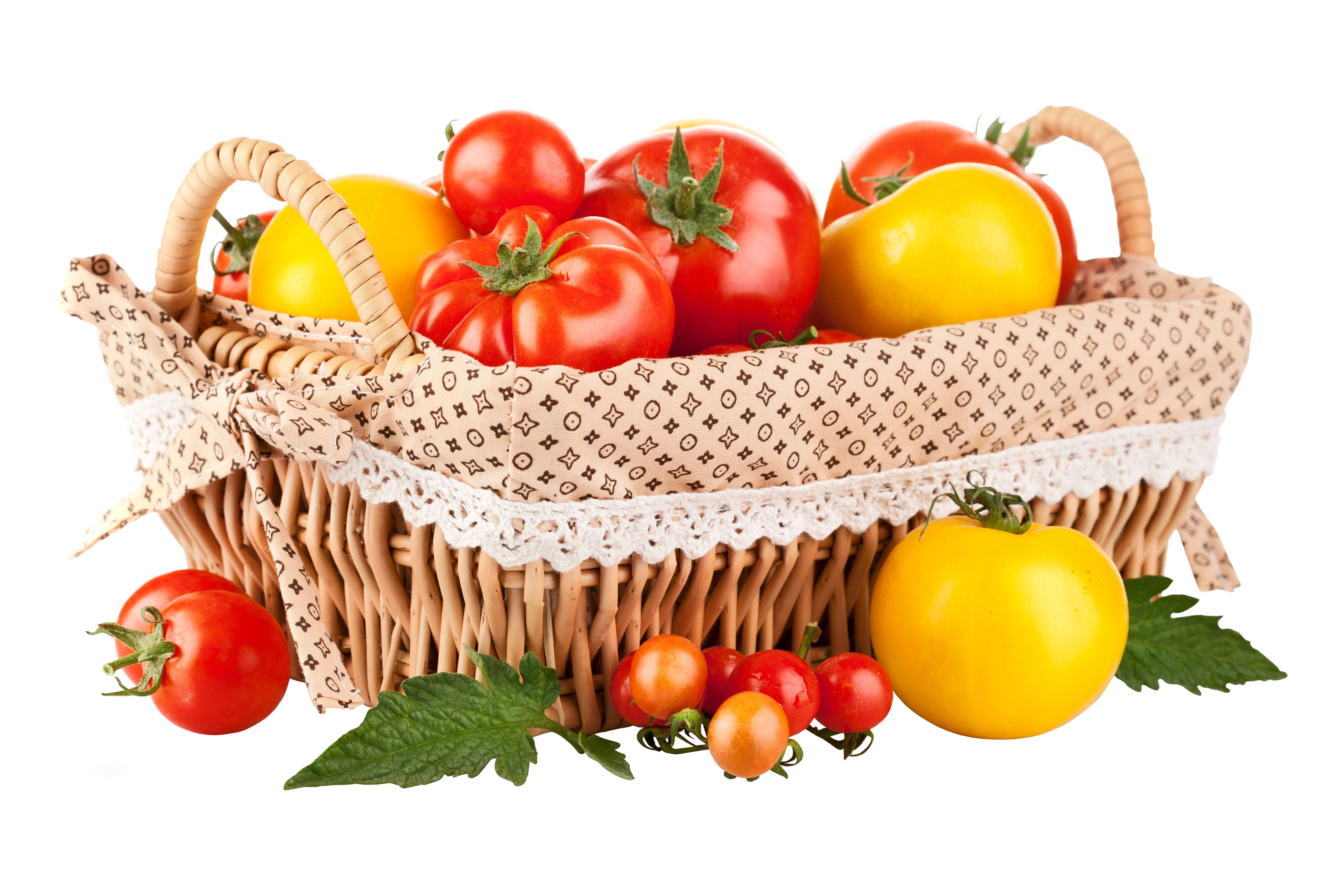 Tomatoes in a wicker basket with foliage HD Wallpaper