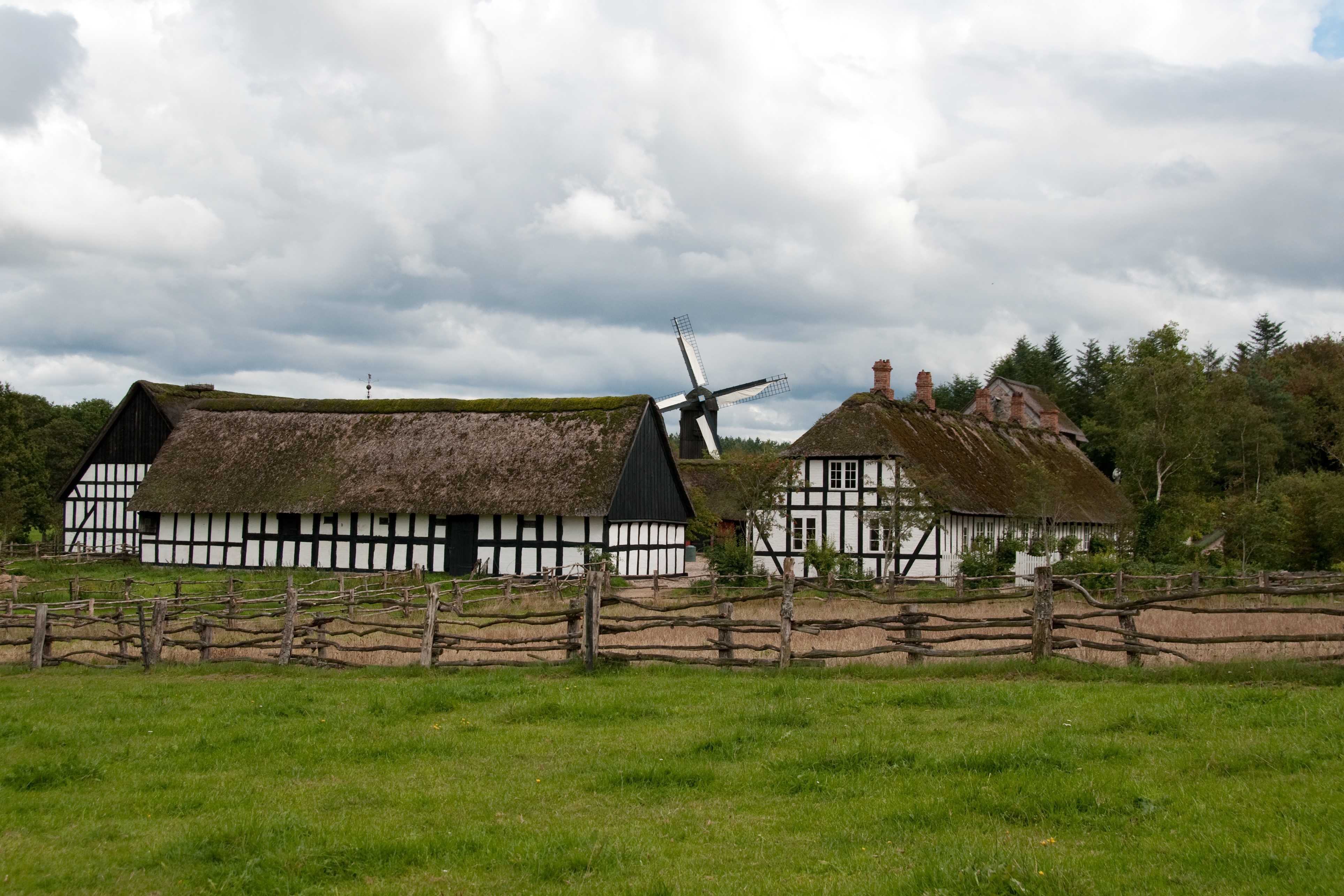 Traditional Danish houses and windmill at Frilandsmuseet HD Wallpaper