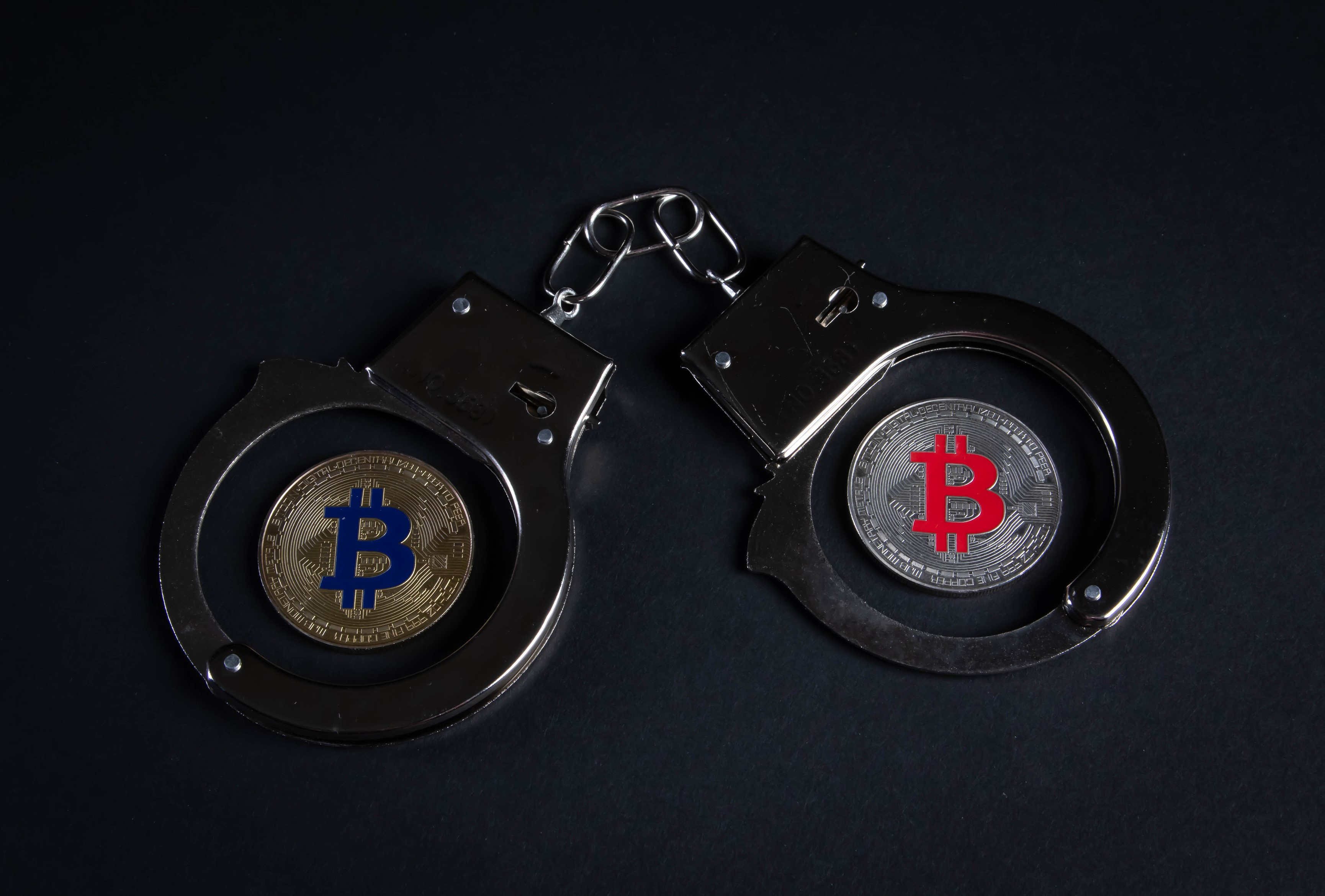 Handcuffs with Bitcoin coins HD Wallpaper