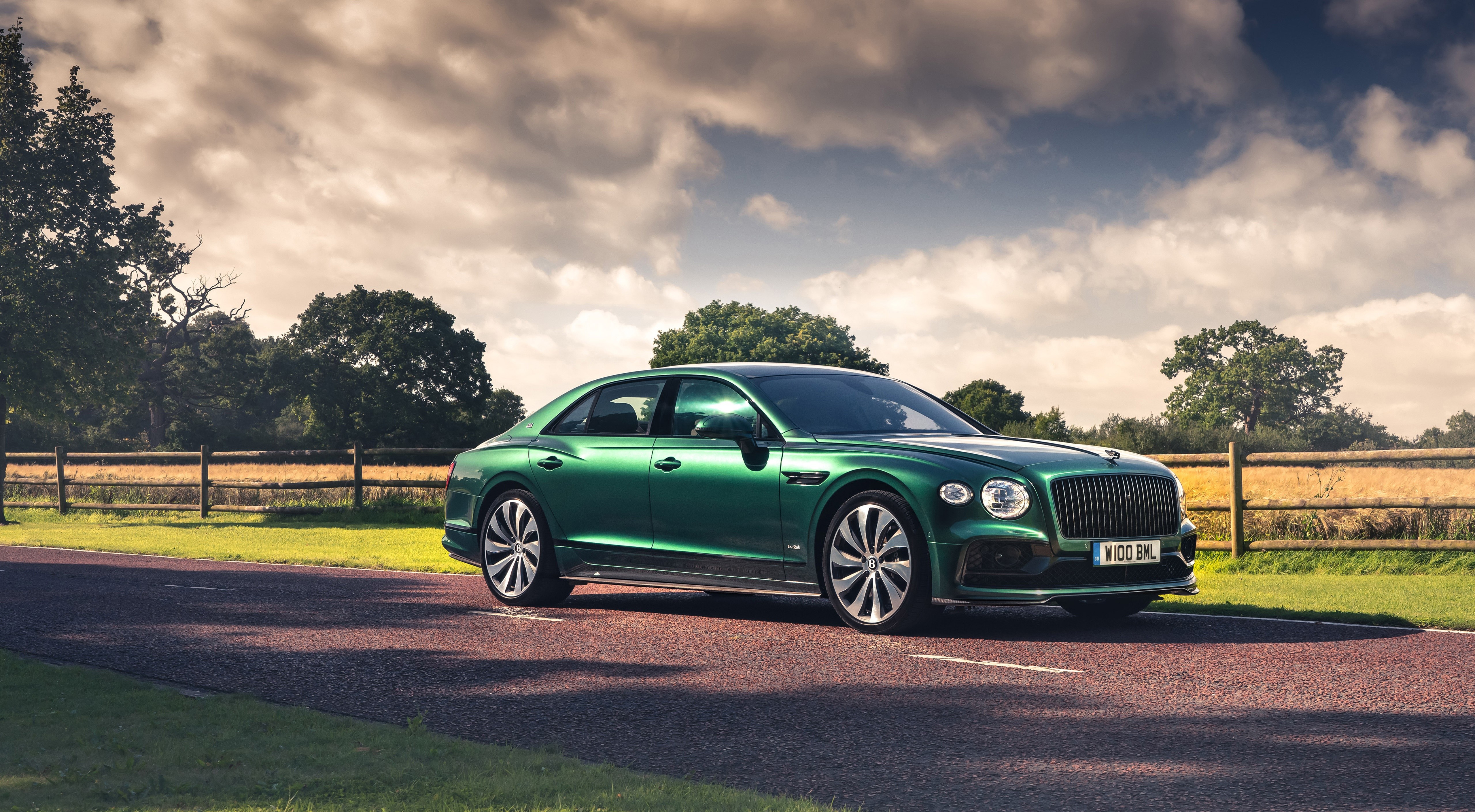 Green Bentley Flying Spur Sedan on a Road HD Wallpaper