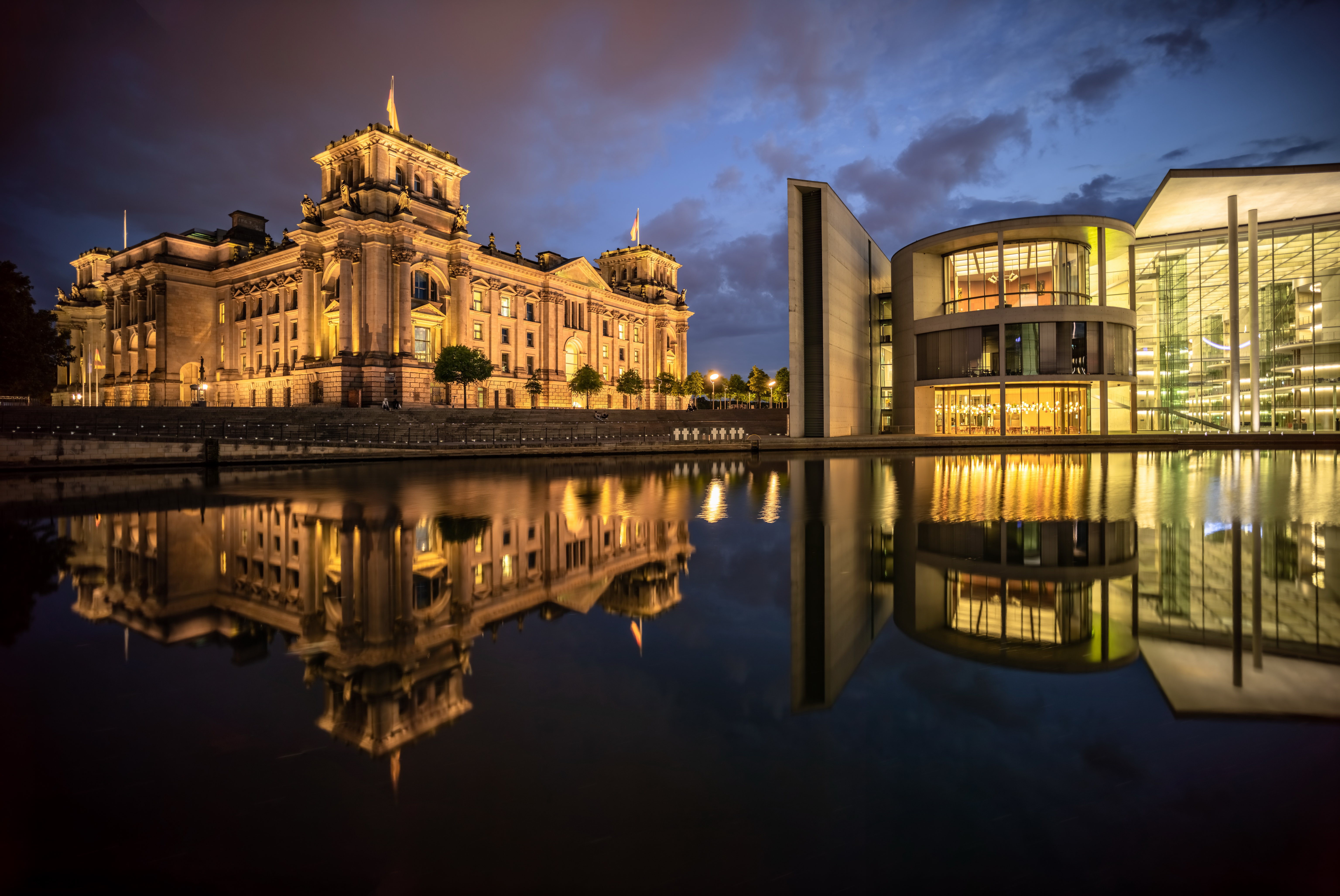 Reichstag Building and modern architecture in Berlin at night HD Wallpaper