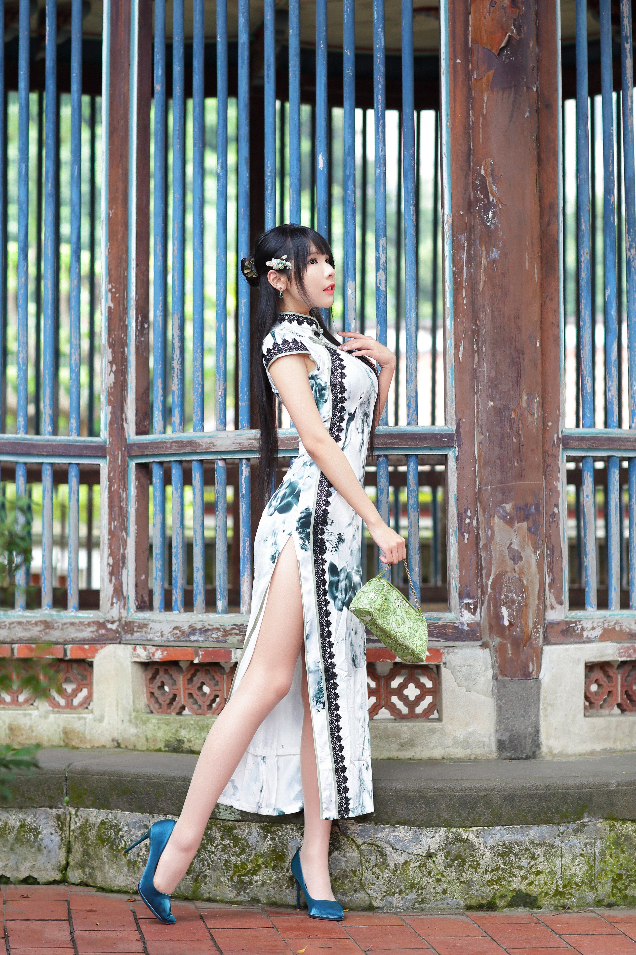 Asian Woman in Elegant Floral Dress Pose HD Phone Wallpaper