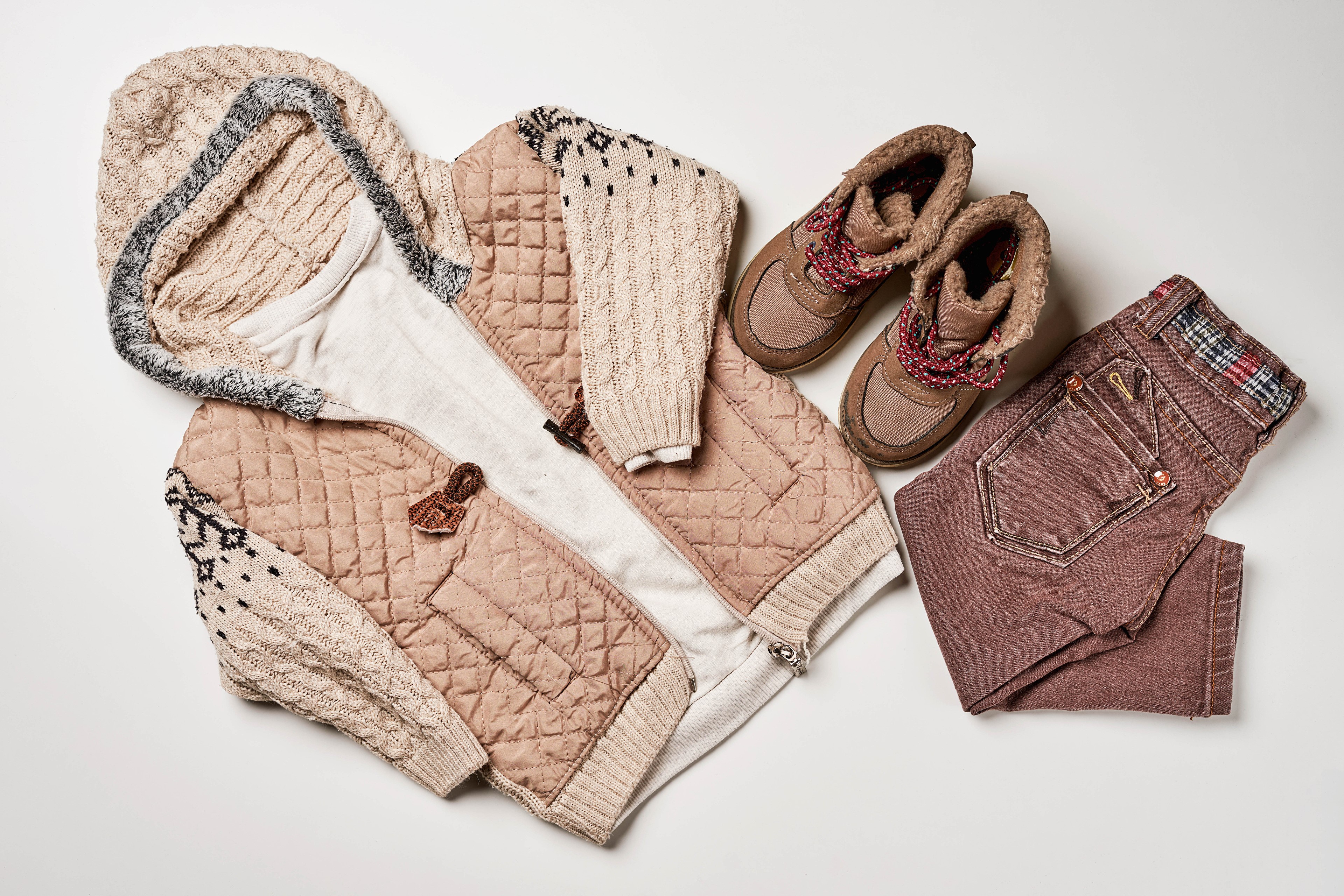 Children's winter outfit: jacket, jeans, and boots HD Wallpaper