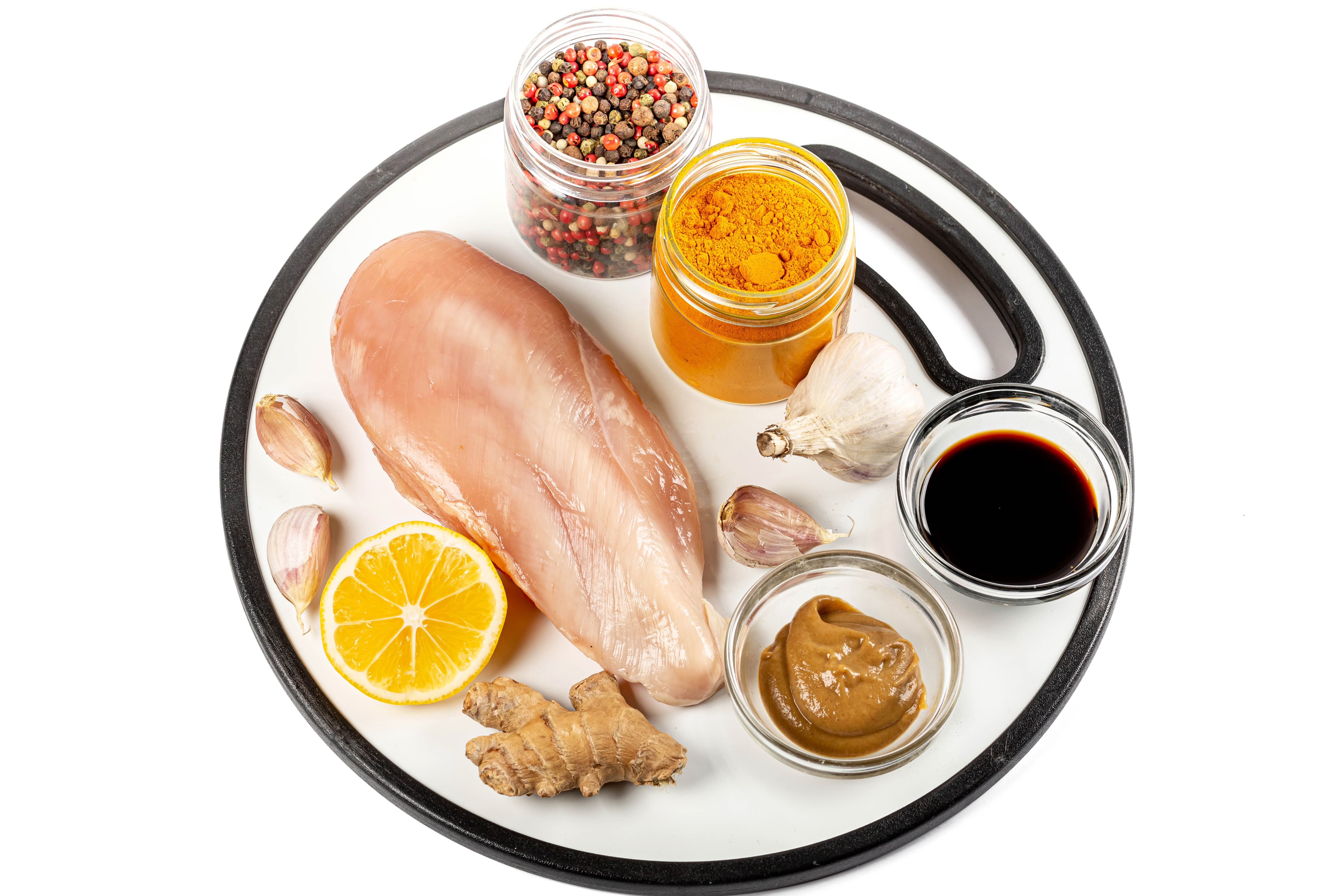 Chicken breast with spices, lemon, garlic, and sauces HD Wallpaper