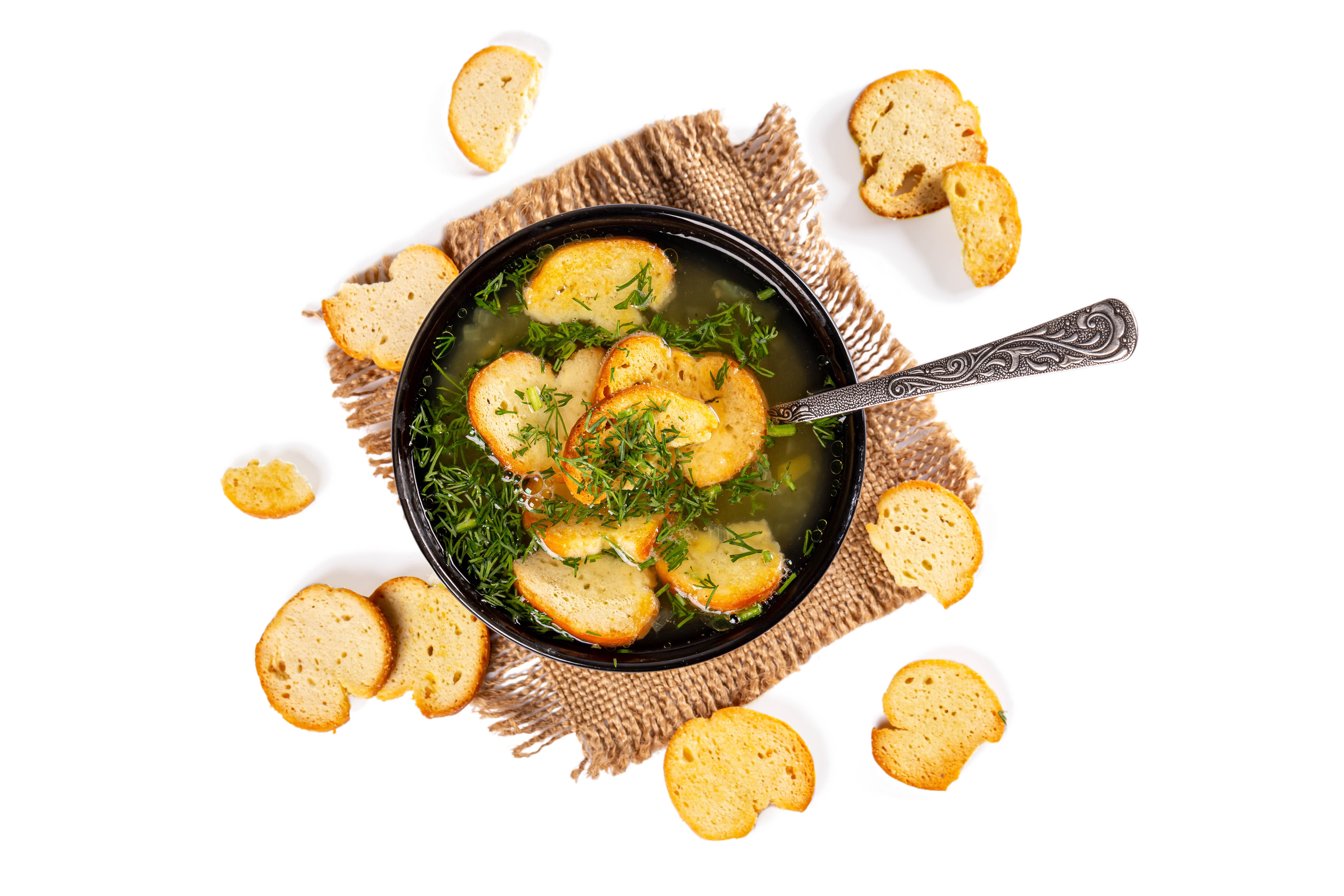 Soup with croutons and dill on a burlap cloth HD Wallpaper