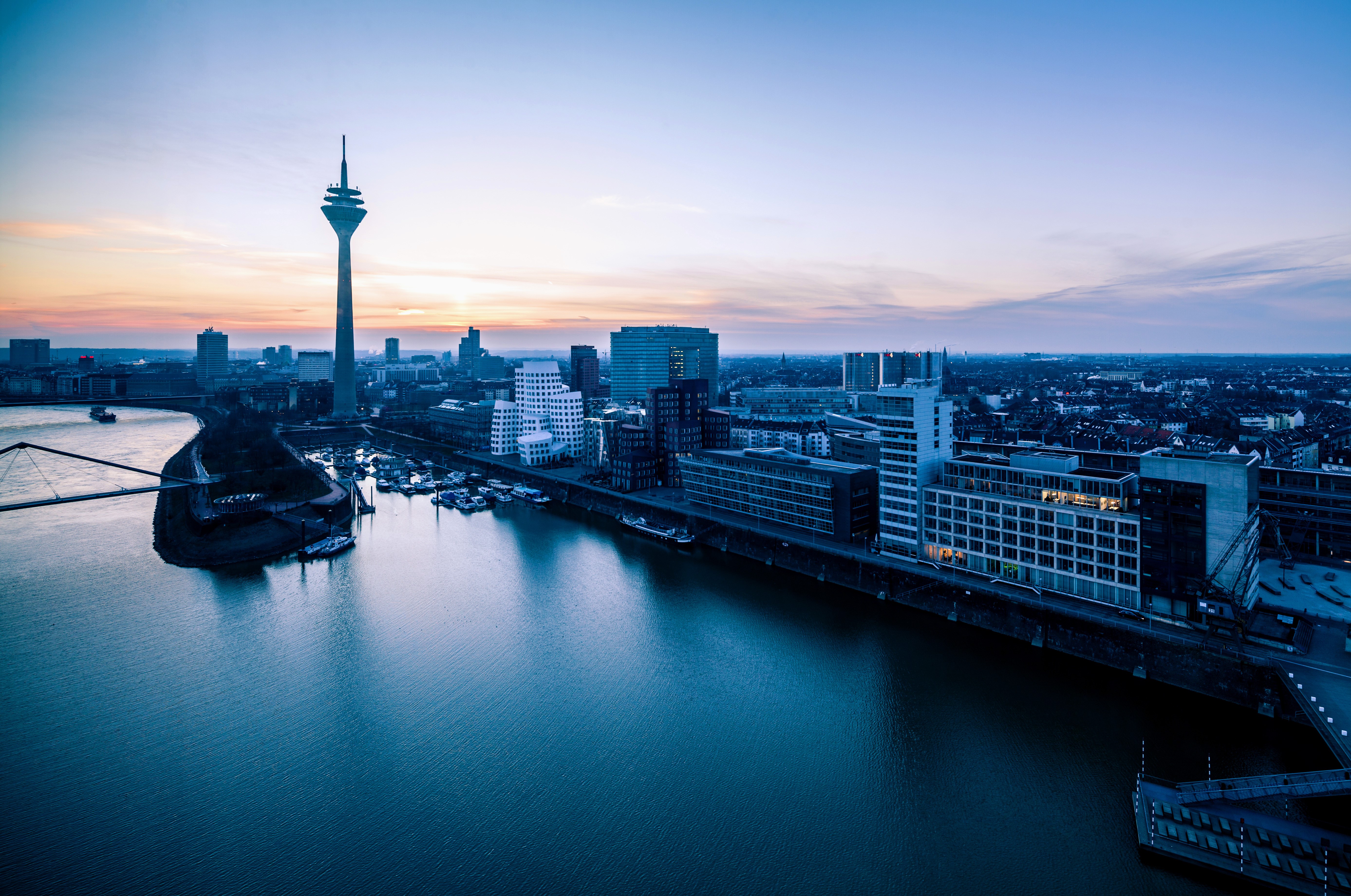 Dusseldorf skyline with Rheinturm tower at sunset HD Wallpaper